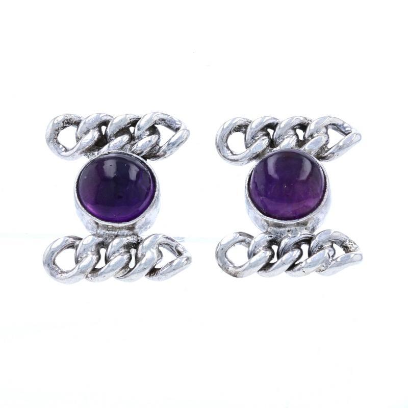 Designer: Emma Melendez
Herkunft: Taxco

Metallgehalt: Sterling Silber

Informationen zum Stein: 
Echte Amethyste
Schliff: Cabochon
Farbe: Lila

Ohrringe Stil: Großer Ohrstecker
Ohrringe Verschlusstyp: Nicht durchbohrte Schraubverschlüsse
Halskette