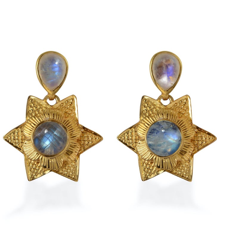 

These beautiful Moonstone Gold Plate Drop Earrings,  are made using our bestselling rainbow moonstones. Handmade in our workshops, they feature exquisite hand engraving work in the shape of the sun and stars. The earrings are made in sterling