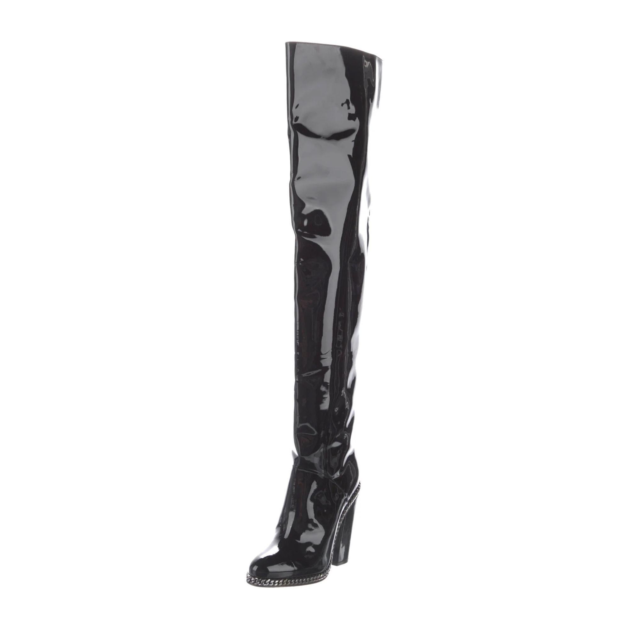 The high-heeled over-the-knee boots features patent leather, 4.1” heel, leather soles, contours adorned with a silver metal chain. Fits true to size; select your usual size. Balmain reference number: W8FC331PGOD176

COLOR: Black
MATERIAL: Patent