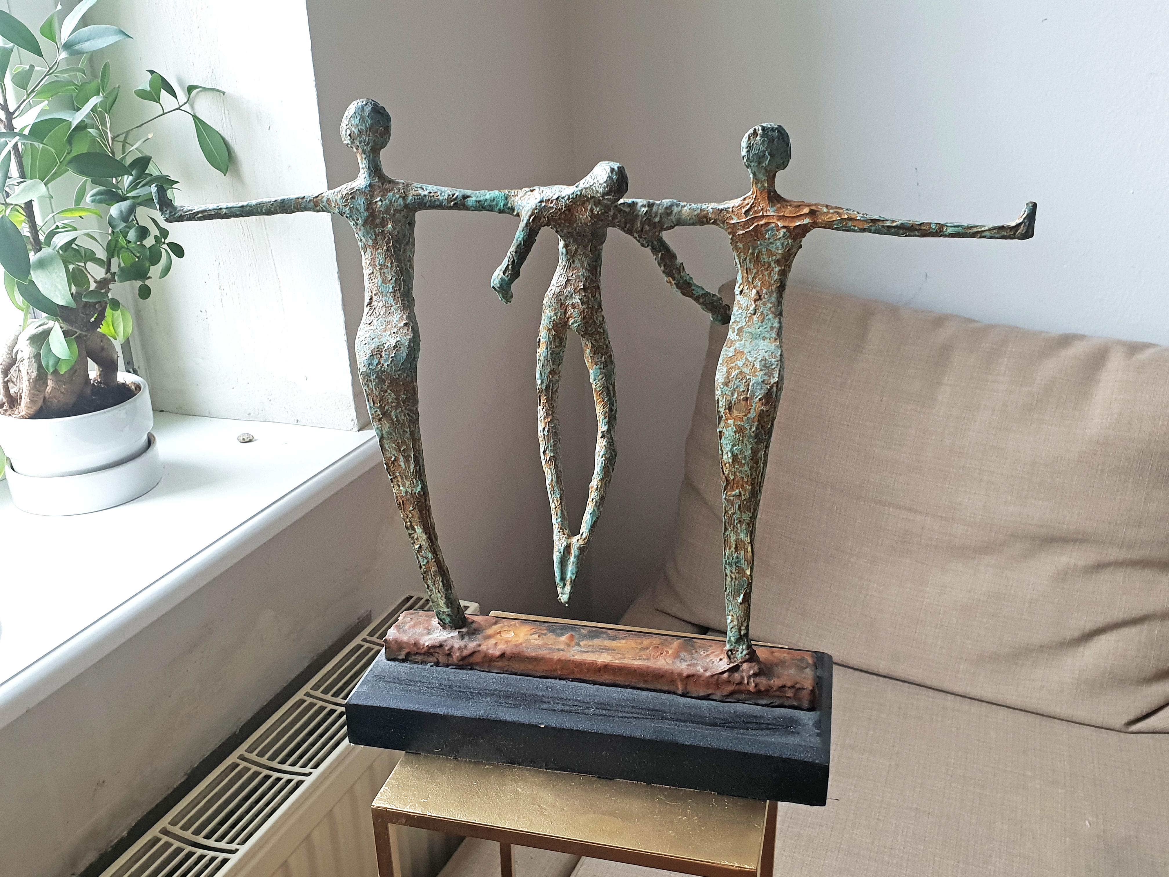 Balance -  Emmanuel Okoro Bronze Resin sculpture of 2 figures holding a third For Sale 4
