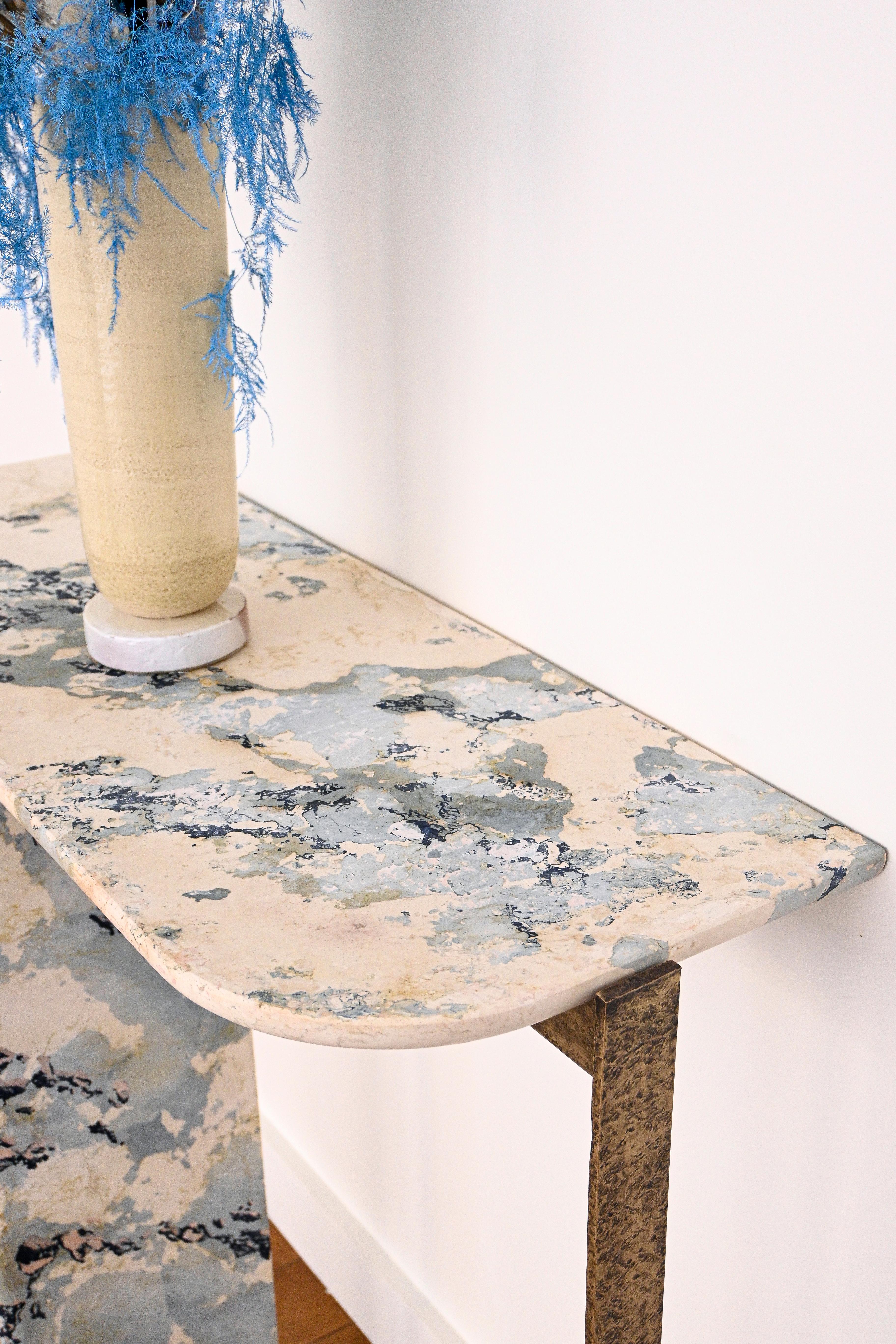 
The EOC-1 Console in Marble stucco is a unique piece, the result of a collaboration between the designer Emmanuel Outy and the artist Amandine Antunez from the AA Matière workshop.

Marble stucco is a know-how that appeared in Italy in the 17th