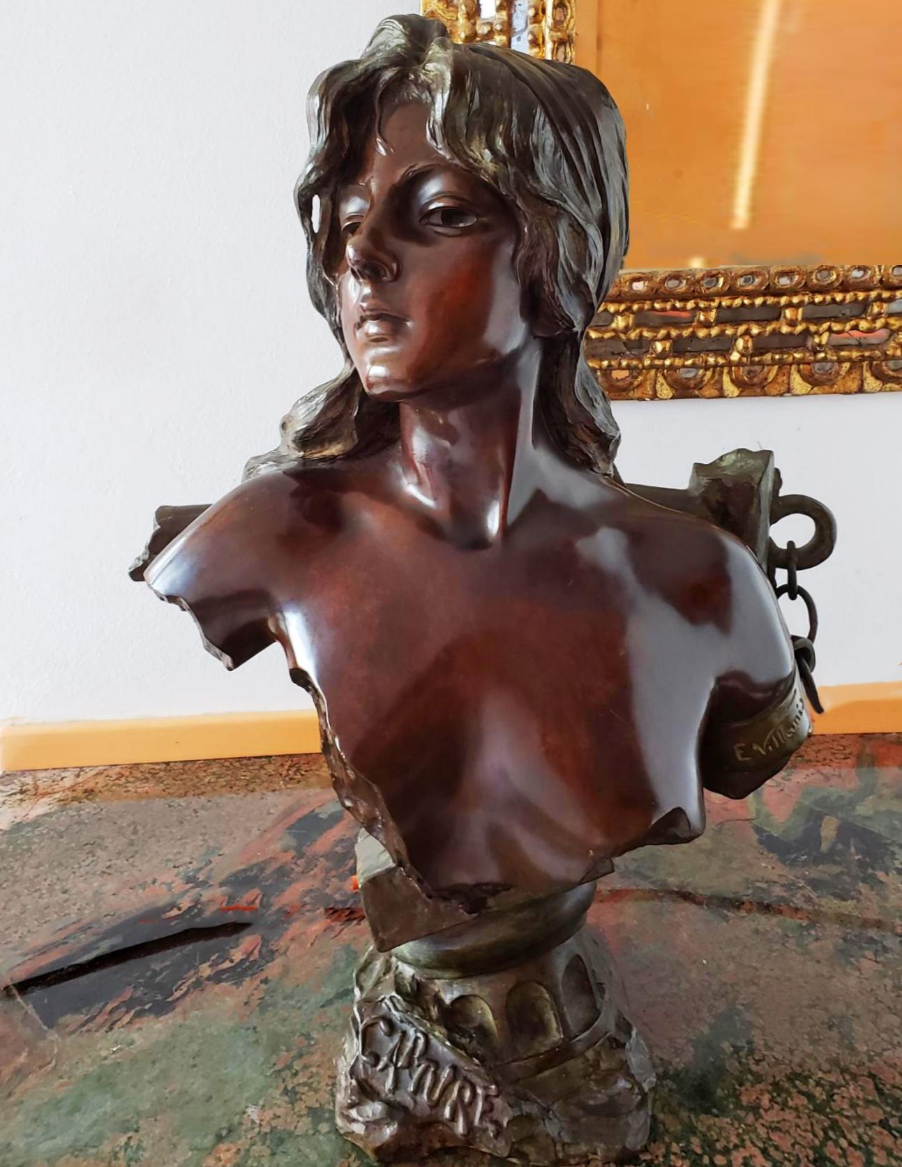 Stunning rich brown patina and topping off at an impressive height of 23 1/2 inches makes this Villanis version of Capture ( Slave Girl ) an optically impressive work.  It's even more engaging when you touch it's seductive polished surface. It's