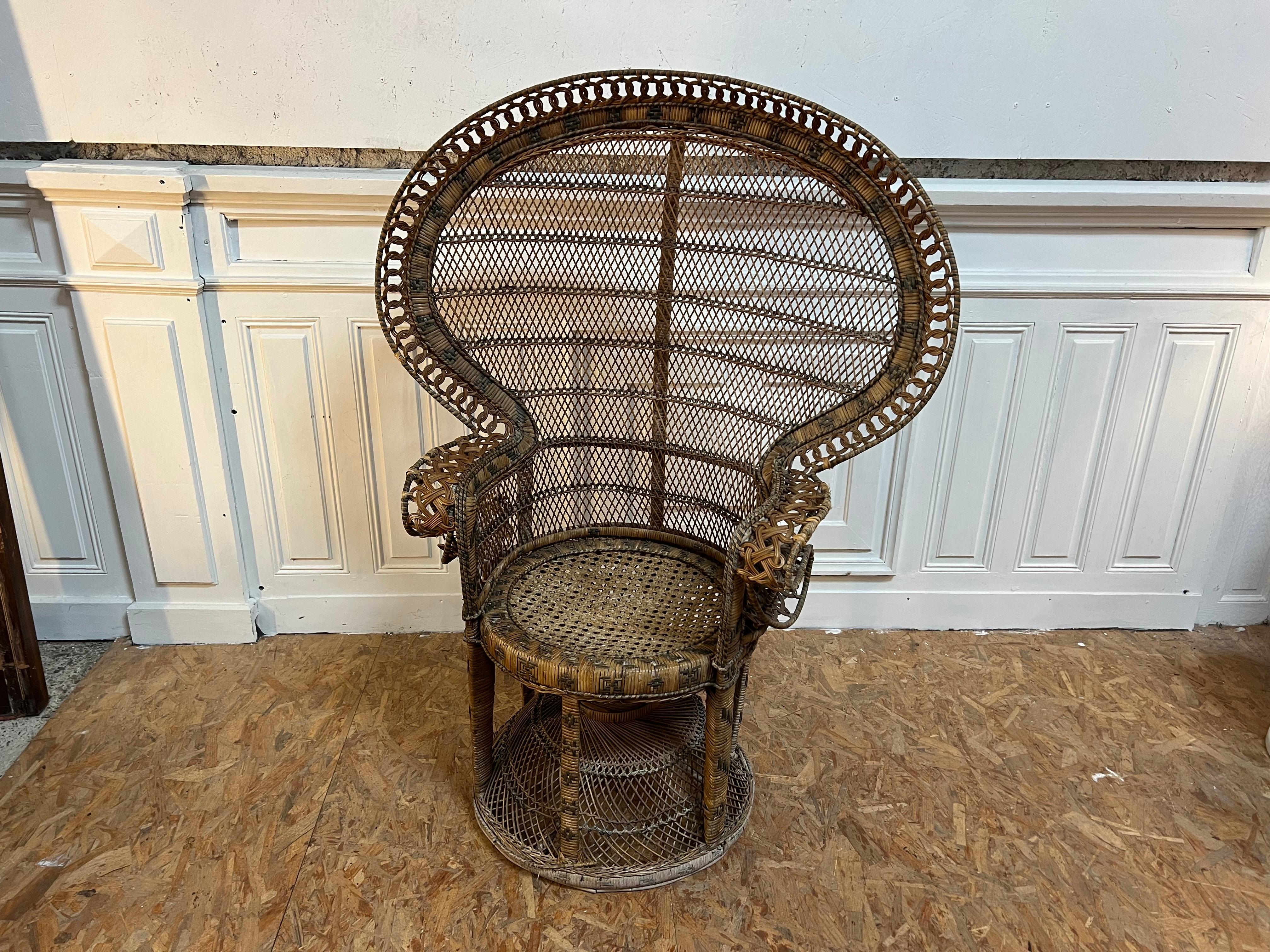 French king sized Emmanuelle chair peacock in perfect condition 
Rattan is original for 50’s and in good conservation, you will use this chair without problems , 
Iconic chair , decorative and confortable 
