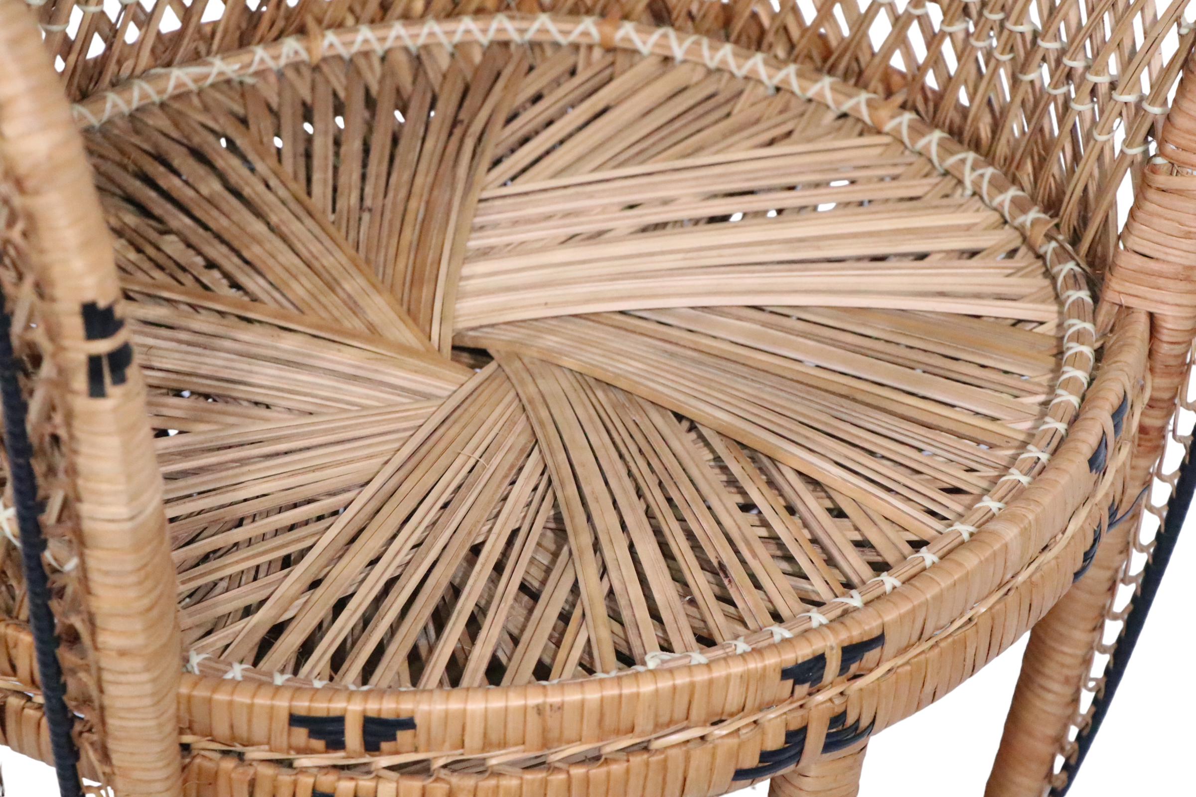 Classic 1960/1970's wicker, rattan Emmanuelle, or Peacock chair, in very good, original, clean and ready to use condition, showing only light wear, normal and consistent with age. 