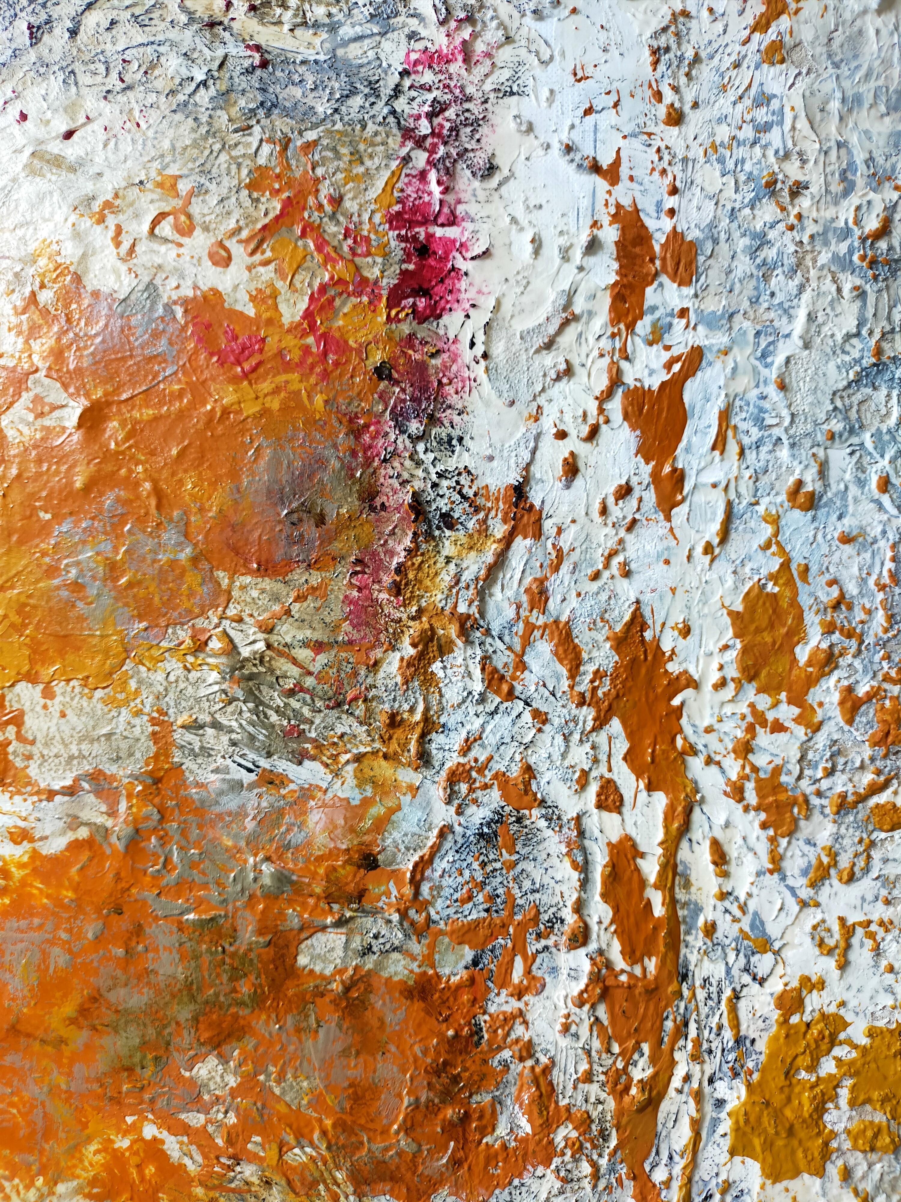 This abstract work displays a dynamic play of textures and colors. The canvas is structured around a dialogue between intense red and bright ochre shades, creating a striking contrast against a background mainly gray-blue and beige. The bold use of