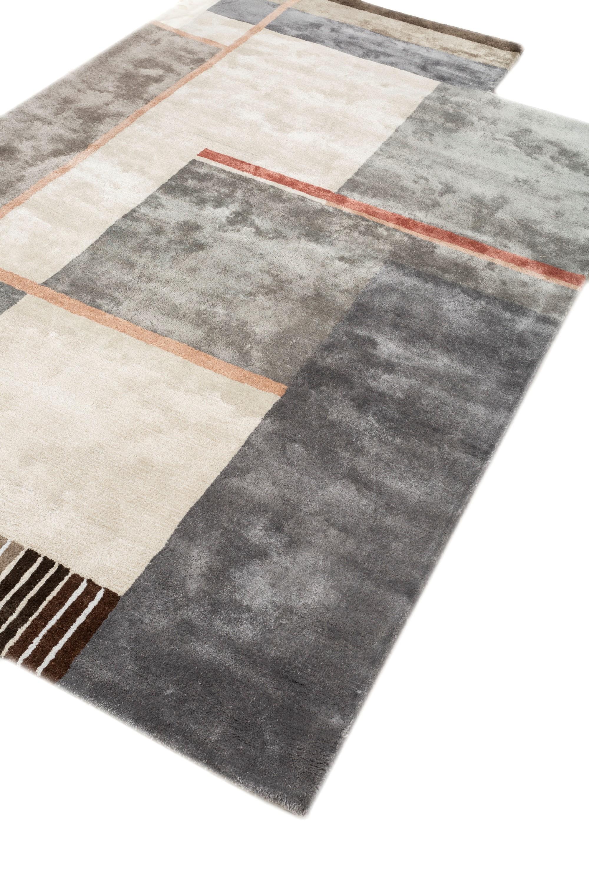 What if a rug could speak volumes through its shapes? Enter this modern marvel, hand-tufted with precision in rural India. Inspired by the profound symbolism of different forms, each woven element carries its own narrative. Crafted from a blend of