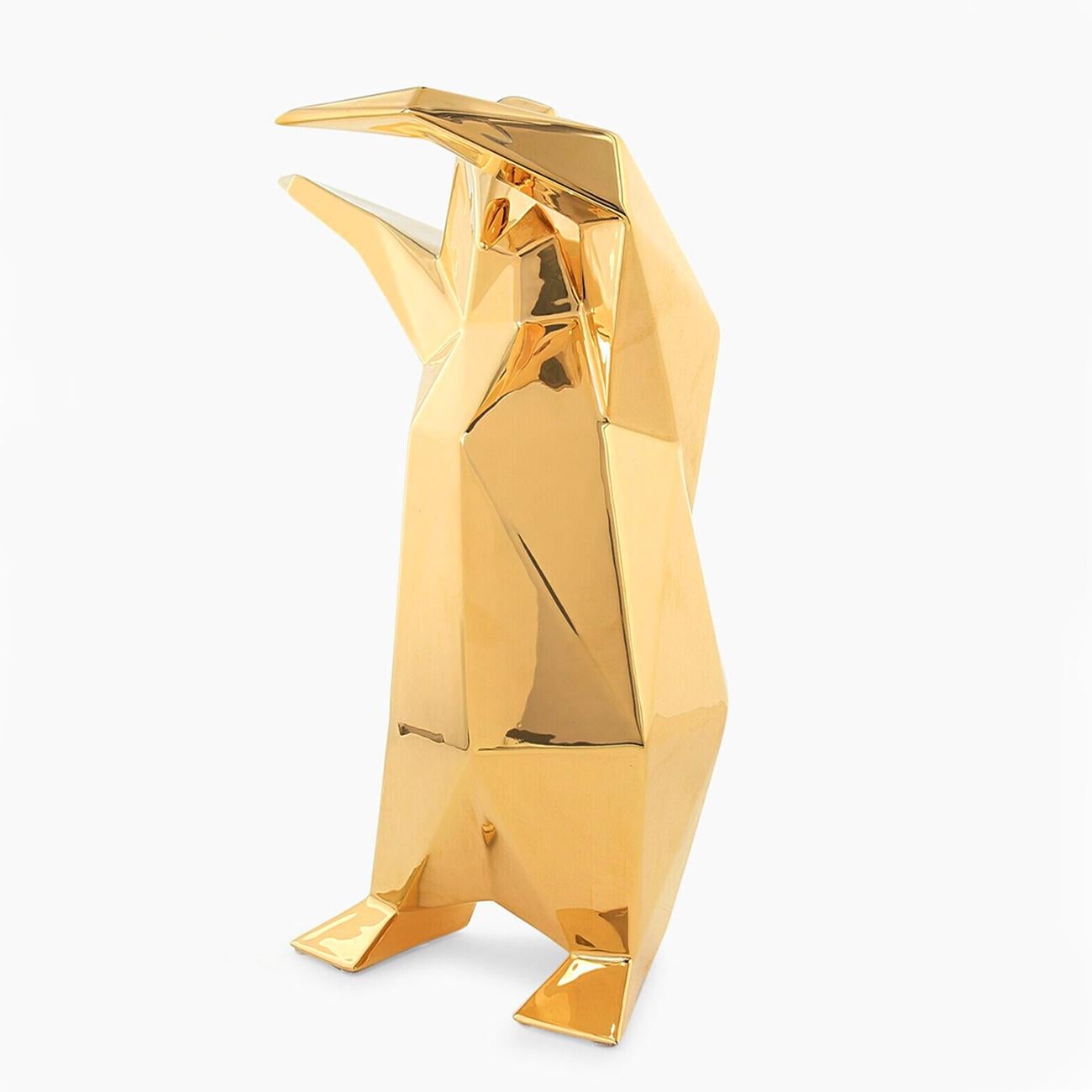 Scultura Empereur Oro con struttura 
in ceramica smaltata con finitura dorata.