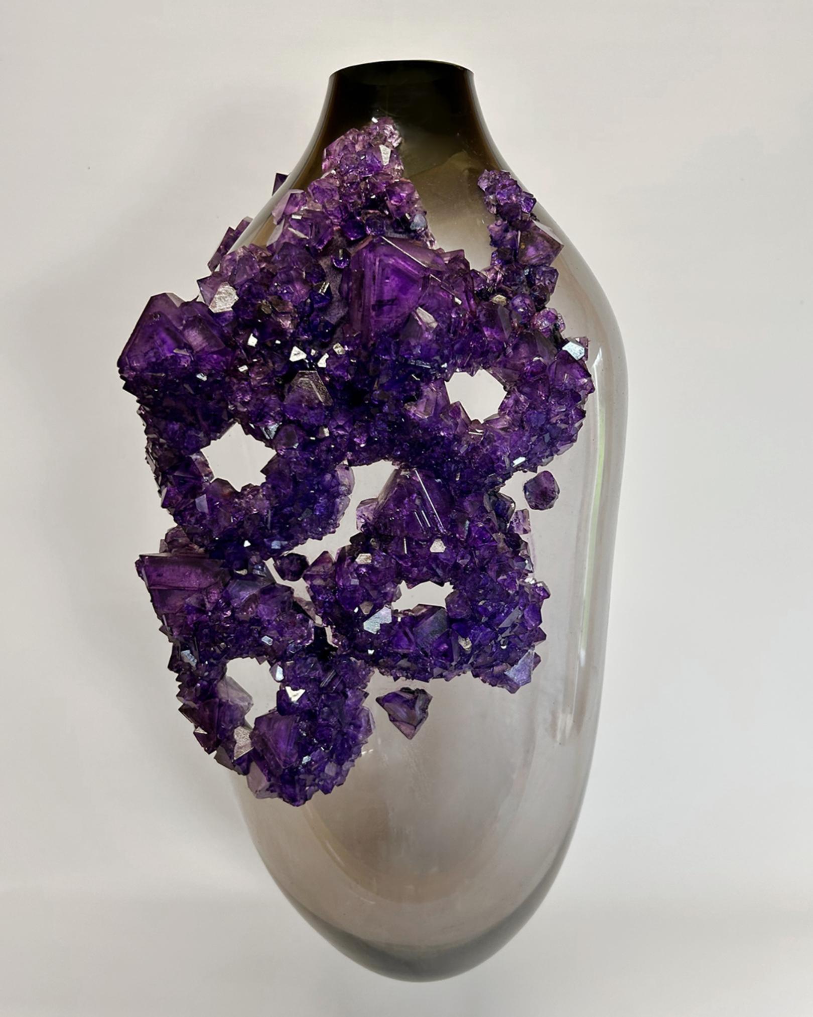 Emperors Breath Vessel 2 by Mark Sturkenboom
Dimensions: W 35 x D 35 x H 75 cm
Materials: Mouth Blown Glass, Overgrown Crystals


Mark Sturkenboom (Driebergen, 1983) is an artist that graduated with honors in 2012 at Artez Academy for the Arts in