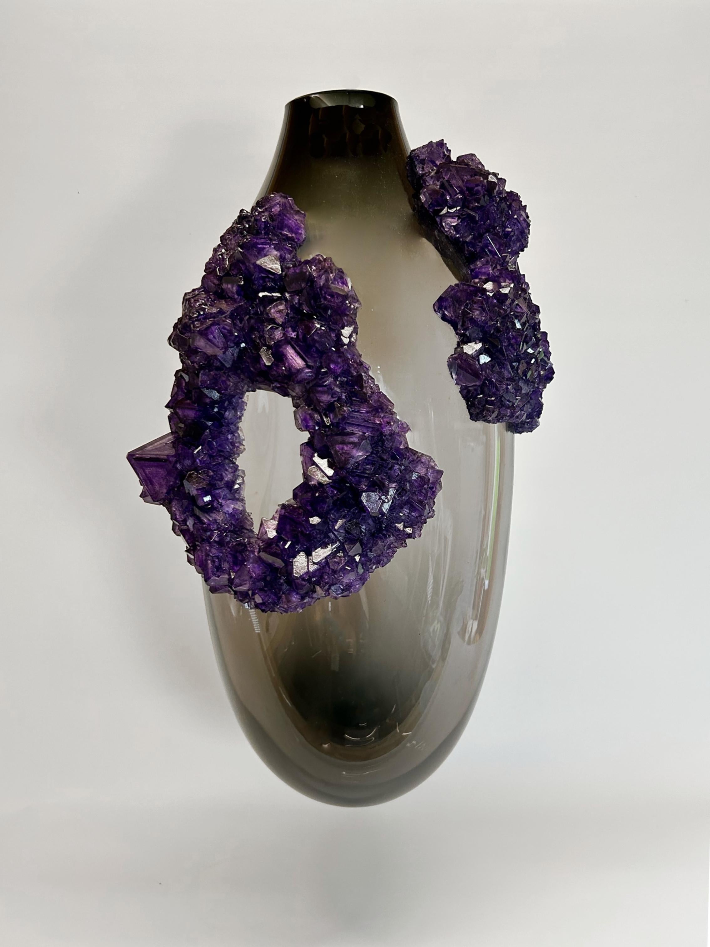 Emperors Breath Vessel 3 by Mark Sturkenboom
Dimensions: W 60 x D 25 x H 30 cm
Materials: Mouth Blown Glass, Overgrown Crystals


Mark Sturkenboom (Driebergen, 1983) is an artist that graduated with honors in 2012 at Artez Academy for the Arts in