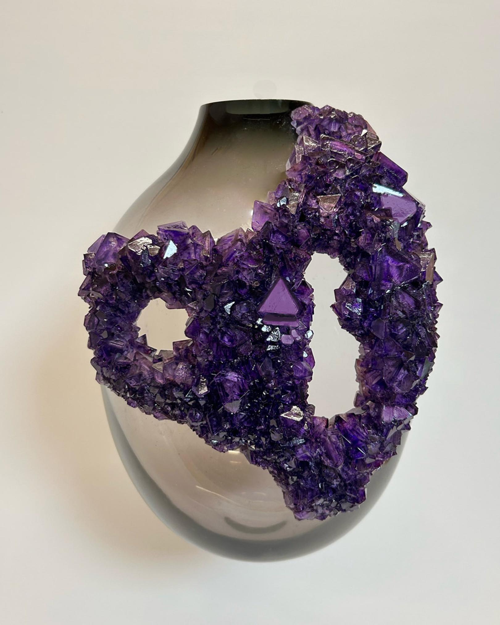 Emperors Breath Vessel 4 by Mark Sturkenboom
Dimensions: W 45 x D 25 x H 30 cm
Materials: Mouth Blown Glass, Overgrown Crystals


Mark Sturkenboom (Driebergen, 1983) is an artist that graduated with honors in 2012 at Artez Academy for the Arts in