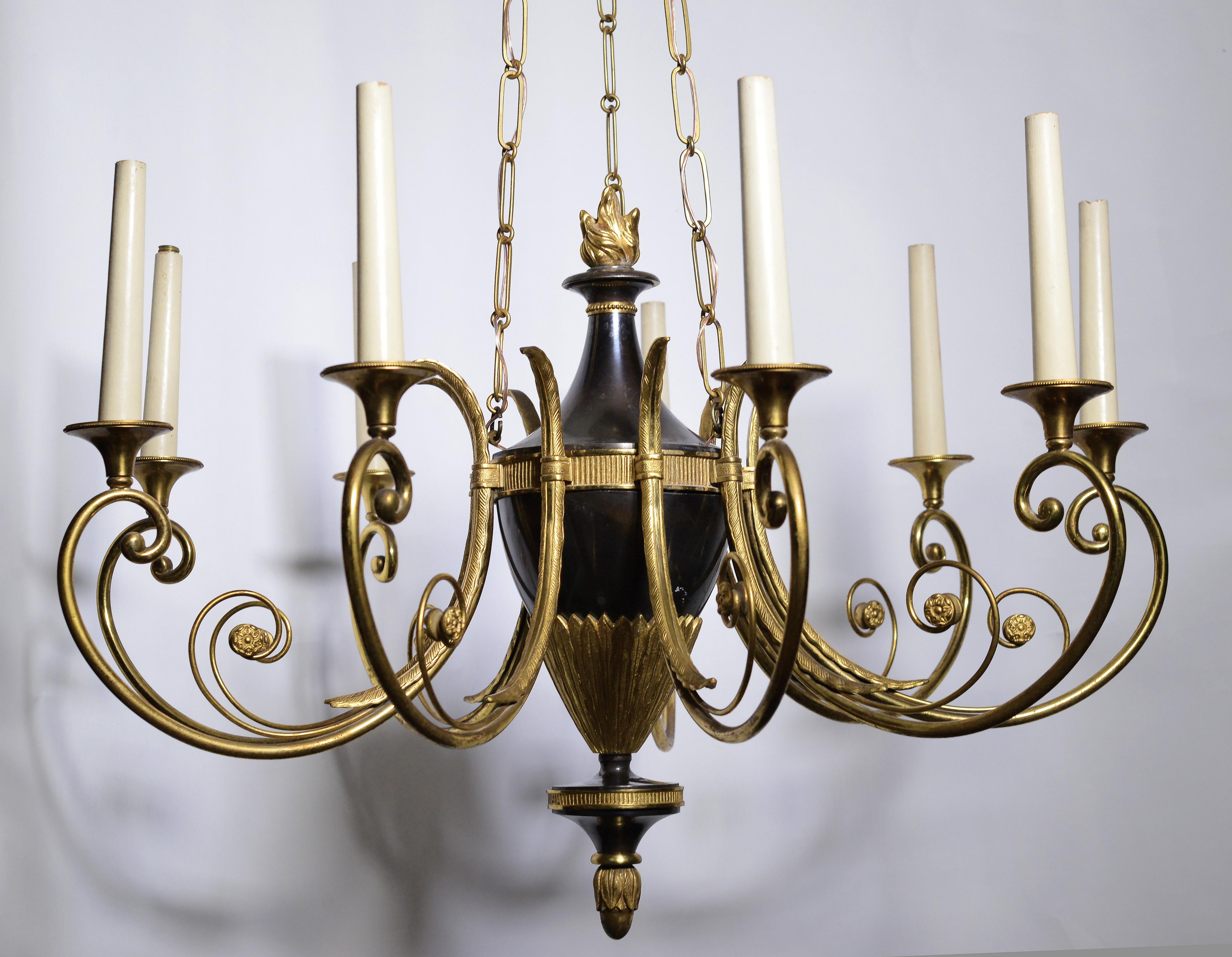 Fine chandelier with flame decoration at center top of amphora shape body. Weapons technology oxidation finish combined with dore bronze of finest quality – just gorgeous creature of most elegant forms made by unidentified continental workshop of