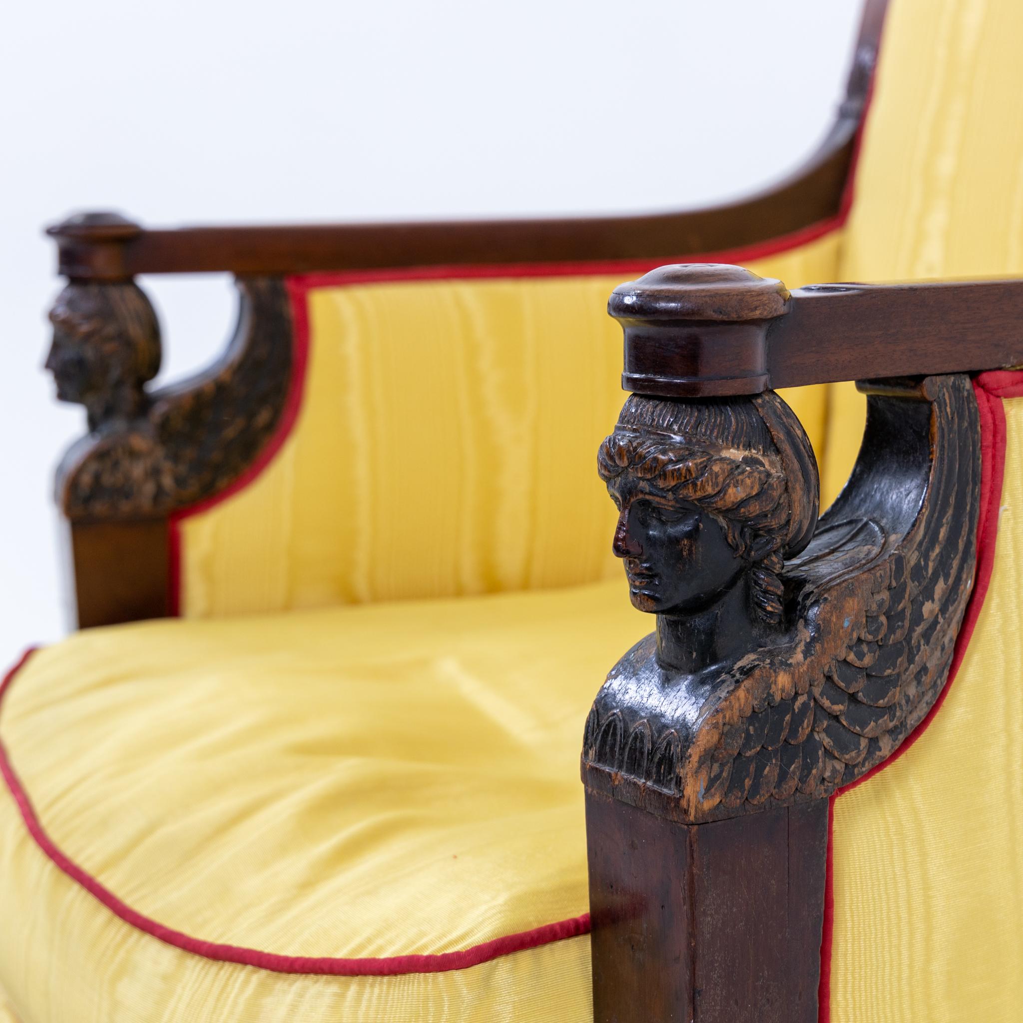 Early 19th Century Empire Armchair with winged Caryatids and yellow Silk Fabric, France circa 1800 For Sale