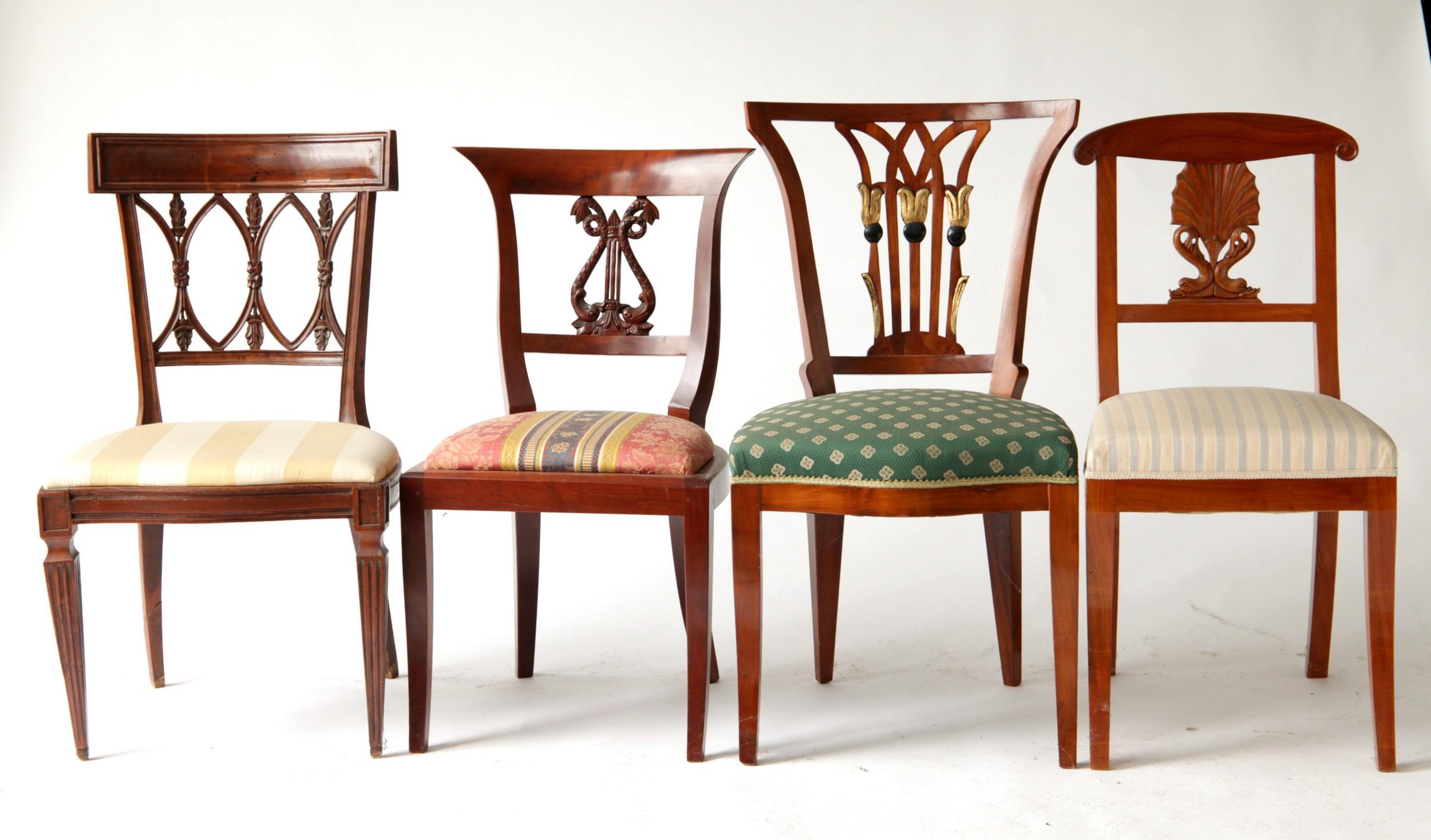 Empire set made up of eight different styles of chairs. Each variety in style and shape is gorgeous. This is the second set of its kind up for sale from the seller. 

A profusion of cherry and walnut wood, with carvings of dolphins and snakes,