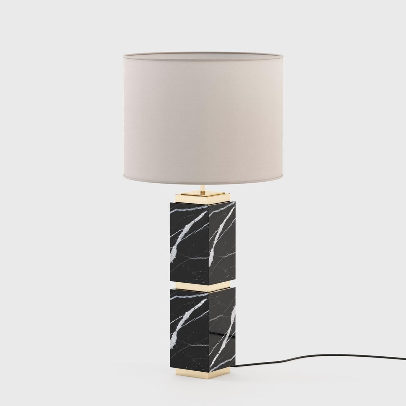 Table lamp Empire black marble with 
solid black marble base and with
polished stainless steel in gold finish.
Including a white coton shade. 1 bulb,
lamp holder type E27, max 40 Watt.
Bulb not included. Base: 15cm x 15cm.