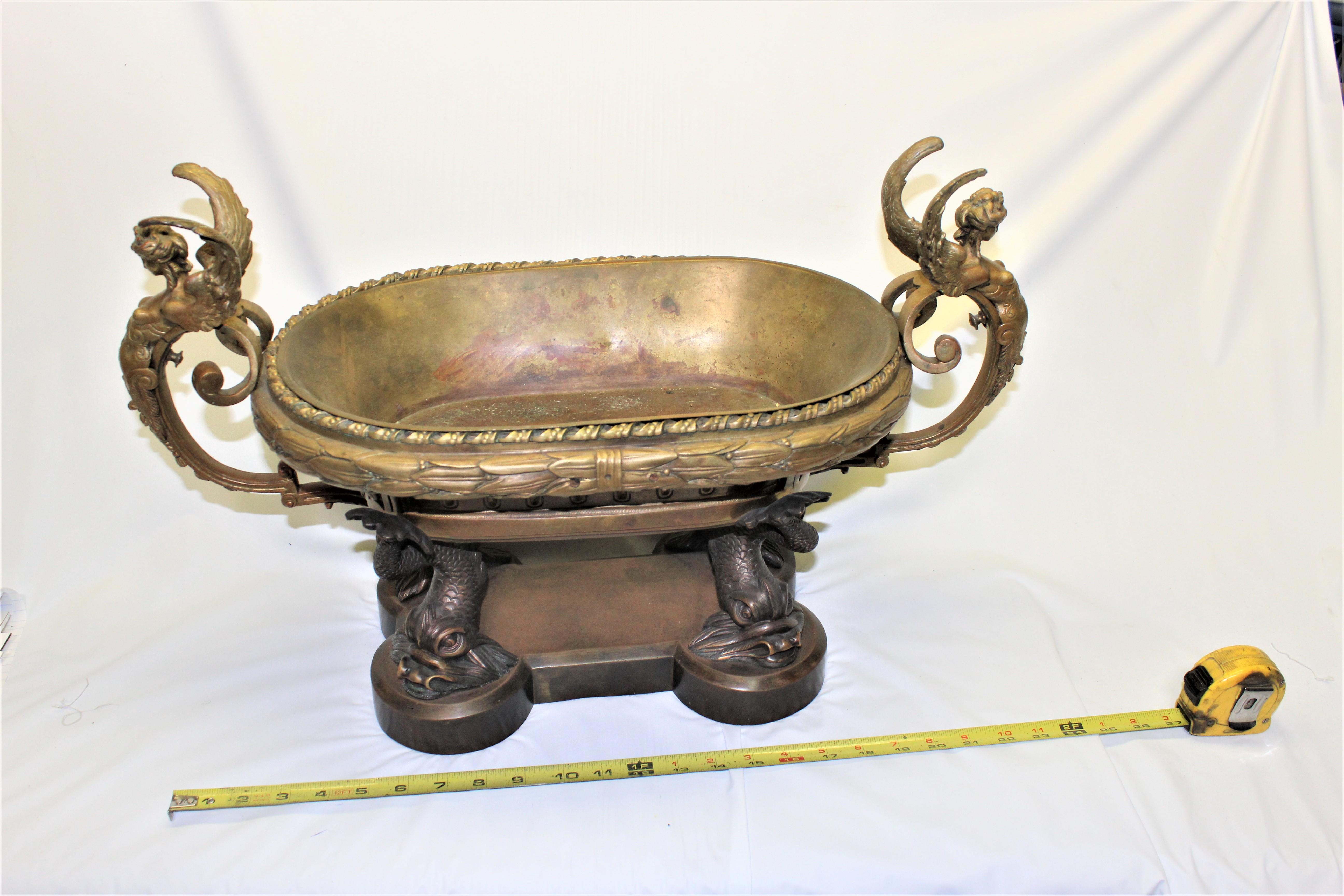 Cast Empire Bowl w Winged Lady's and Dolphins Base Gold Finish For Sale
