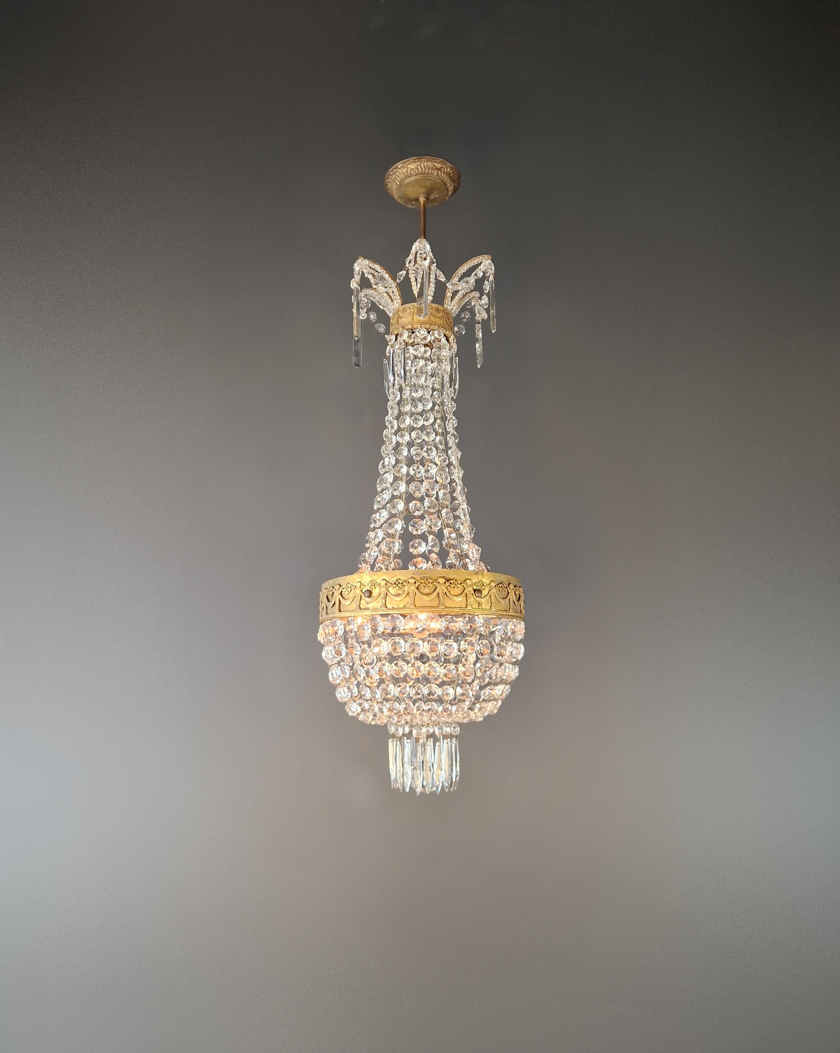 Old chandelier lovingly and expertly restored in Berlin. Electrical installations work in the USA. Rewired and ready to hang. None missing. Wiring completely renewed. Crystal, hand knotted.

Wiring and sockets completely renewed. Hand knotted