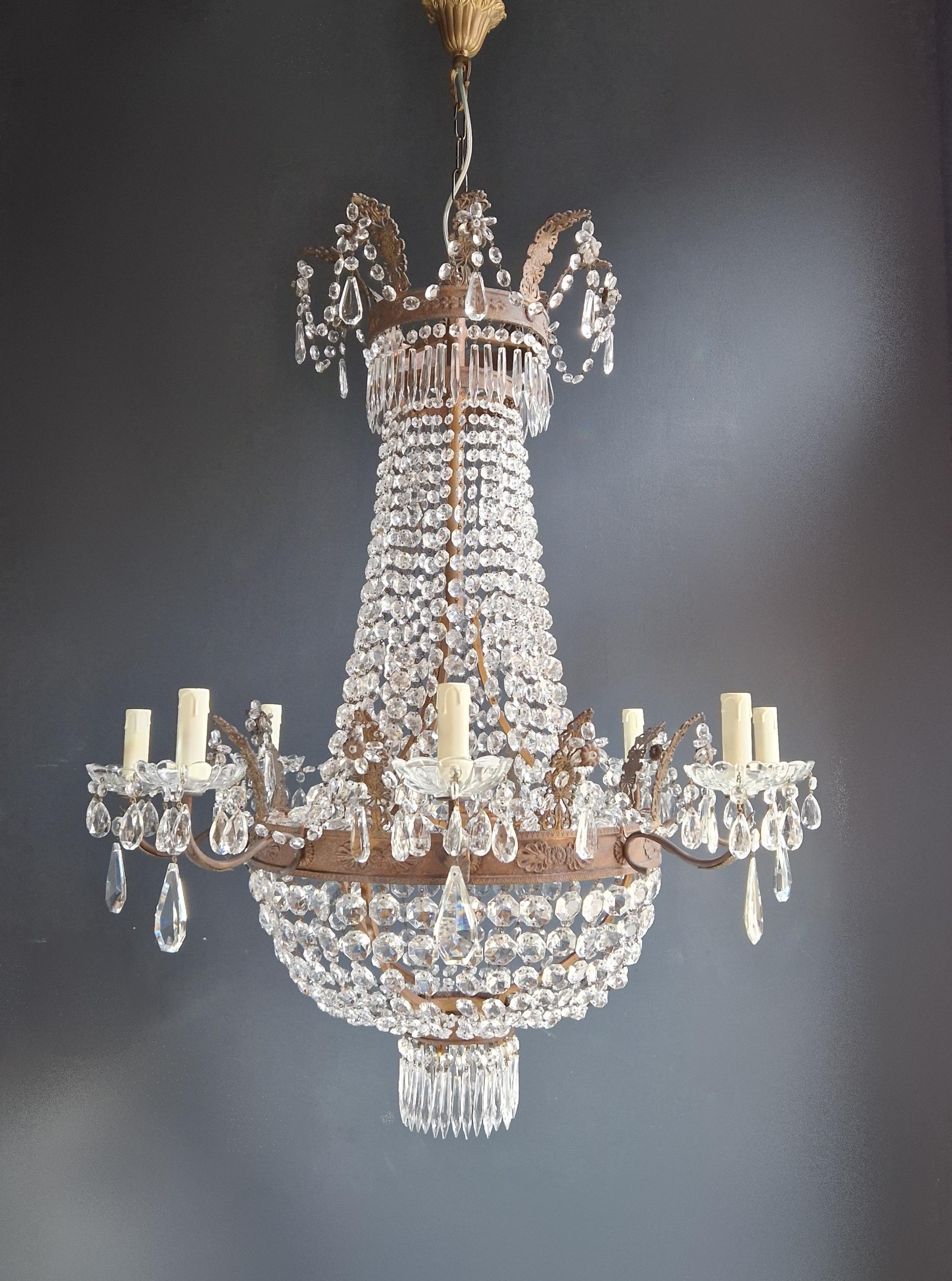 Old chandelier with love and professionally restored in Berlin. electrical wiring works in the US. Re-wired and ready to hang. not one missing. Cabling completely renewed. Crystal, hand-knotted.

Cabling and sockets completely renewed. Crystal hand