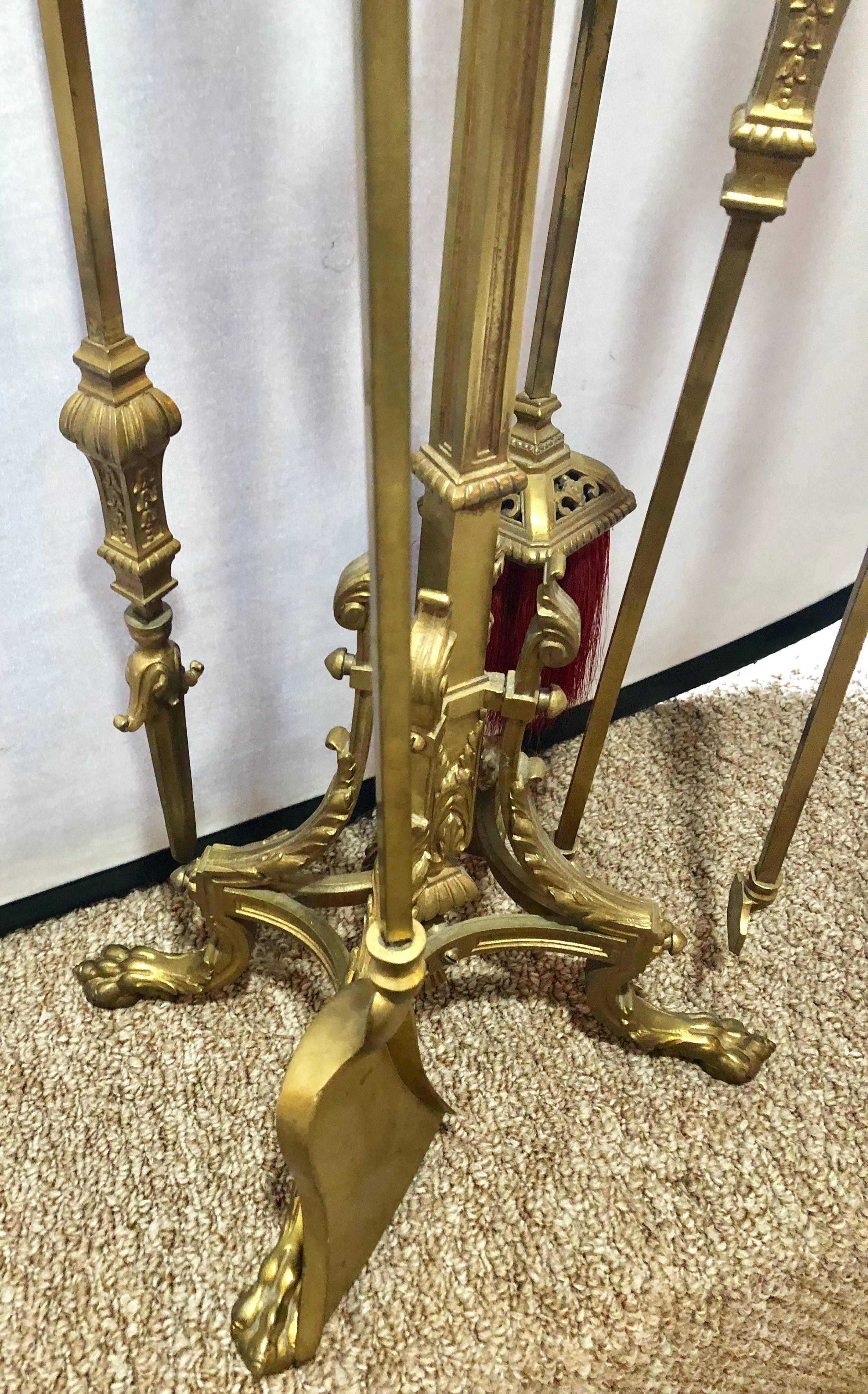 20th Century Empire Brass Fireplace Tool Set Having Four Tools and a Stand