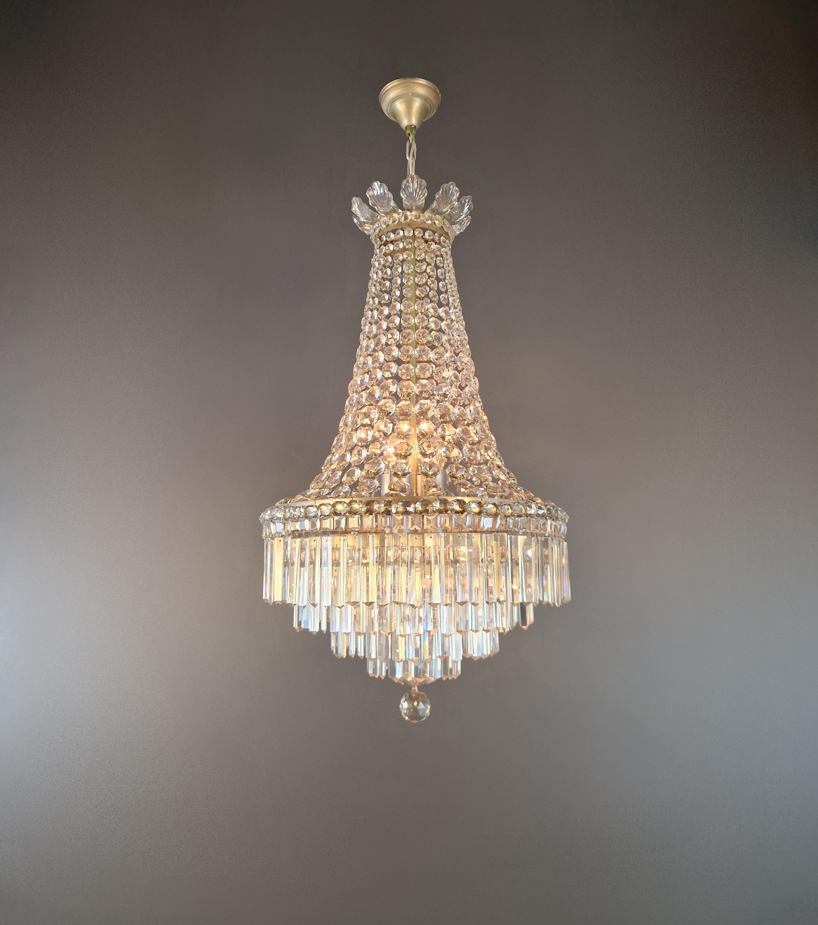 Original antique chandelier, wiring and sockets completely renewed. Crystal hand-knotted.

Dimensions: Height with chain 115 cm, height without chain 95 cm, diameter 53 cm, weight (approx.) 12 kg.
Number of lights: 8 Sockets: E27
New electrics! New
