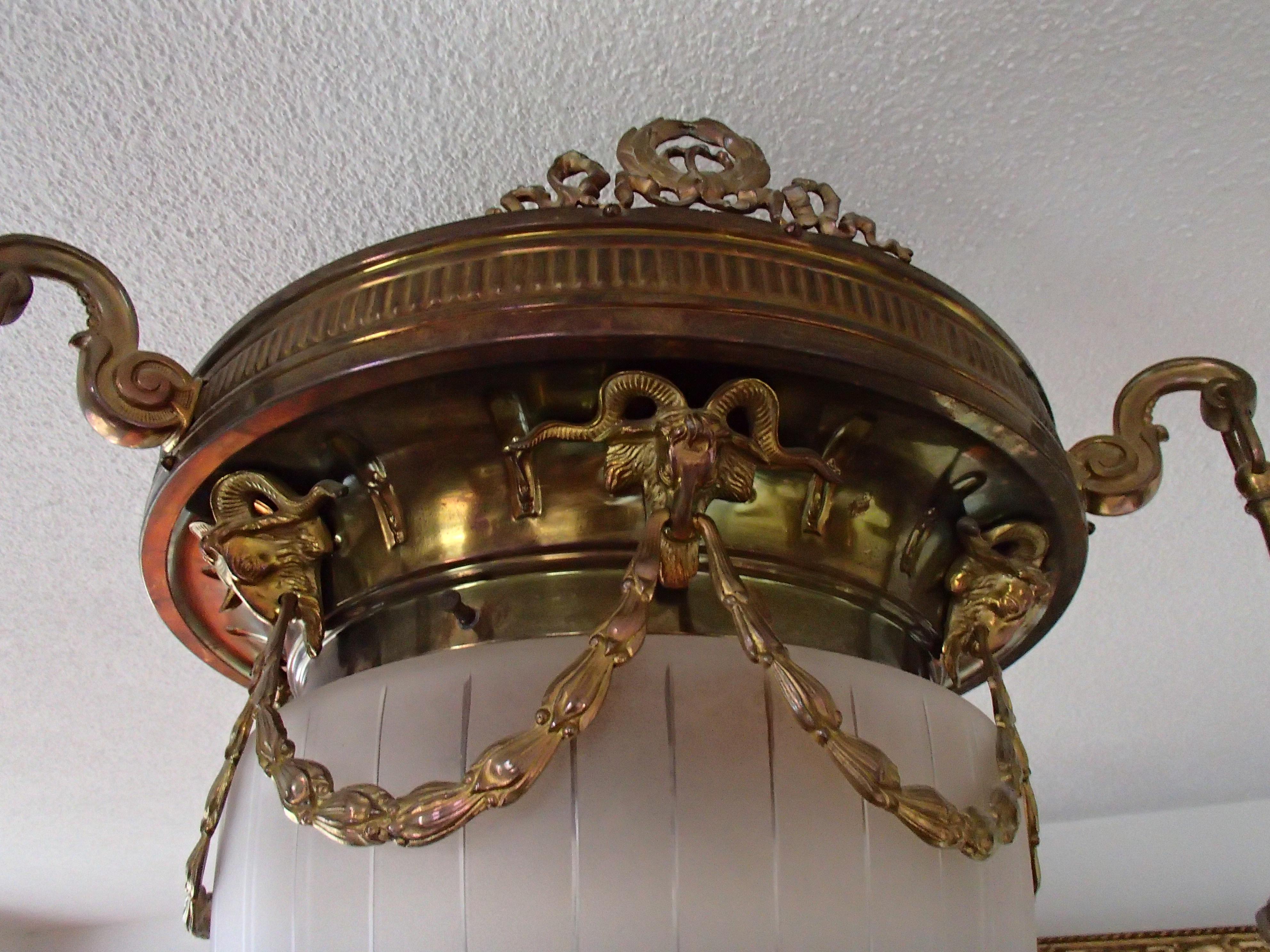 French Empire Bronze and Glass Chandelier with Beliers For Sale