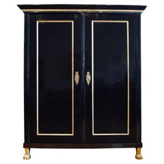 Empire cabinet from Vienna, around 1800, polished black pear wood.