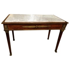 Antique Empire Center Table in Mahogany with Bronze Mounts White Marble Top, 19 th c