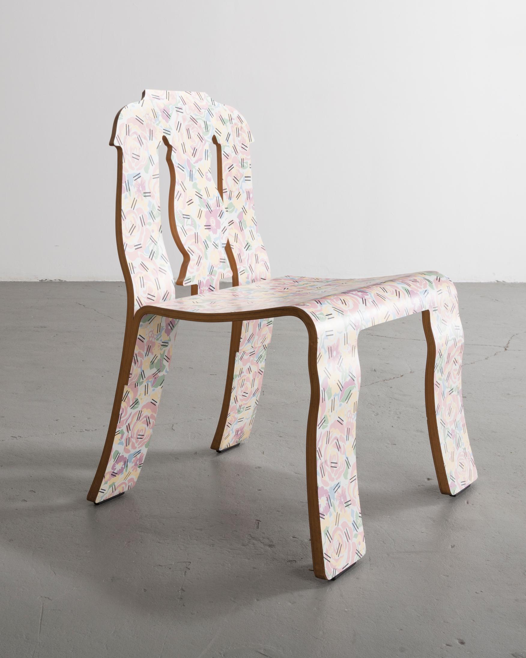 Empire chair in molded plywood with laminated finish in the 