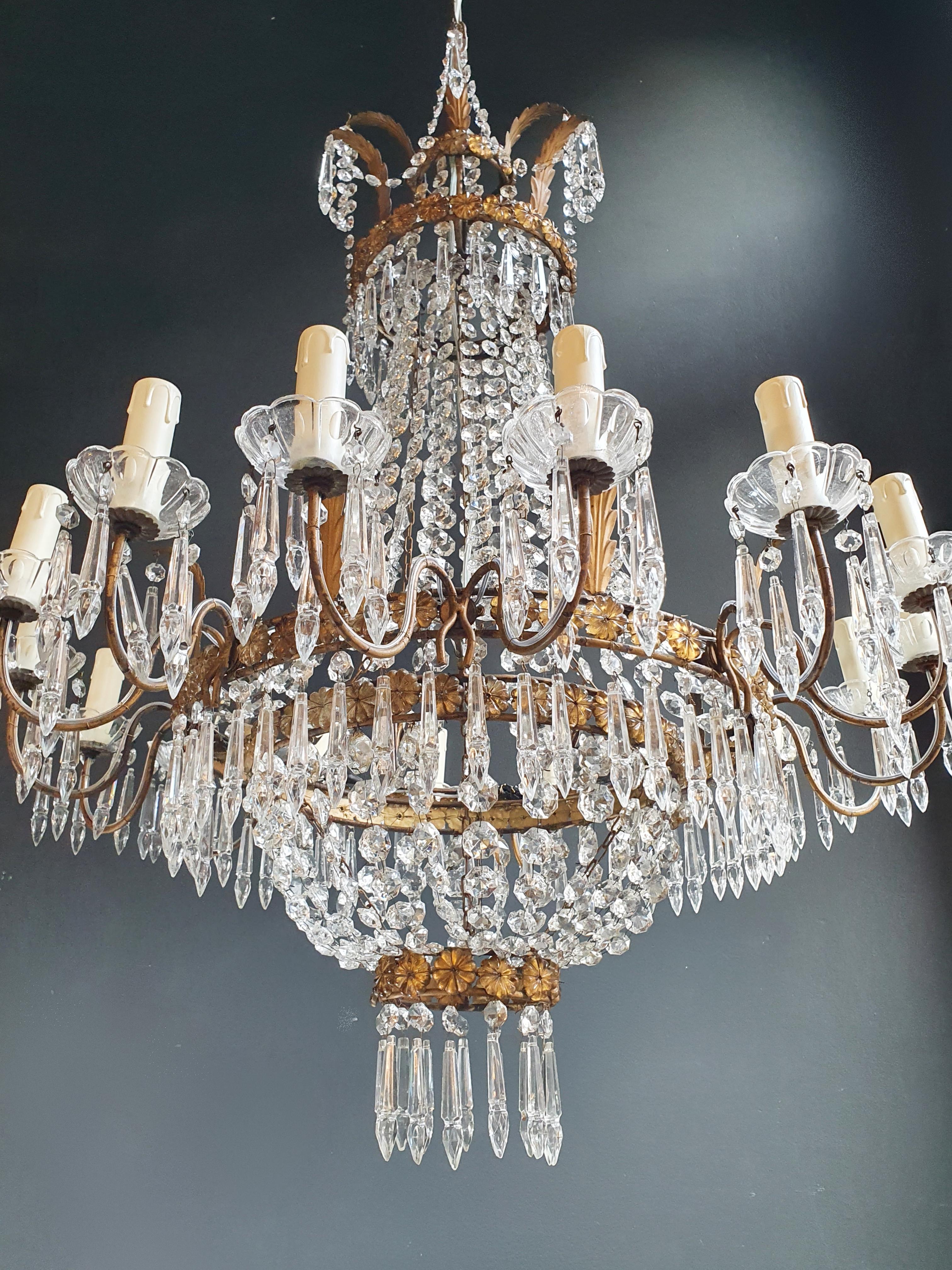 Original preserved chandelier, cabling and sockets completely renewed. Crystal hand knotted.
Measures: Total height 135 cm, height without chain 95 cm, diameter 76 cm, weight (approximately) 12 kg.

Number of lights: 16 light bulb sockets: E14

New