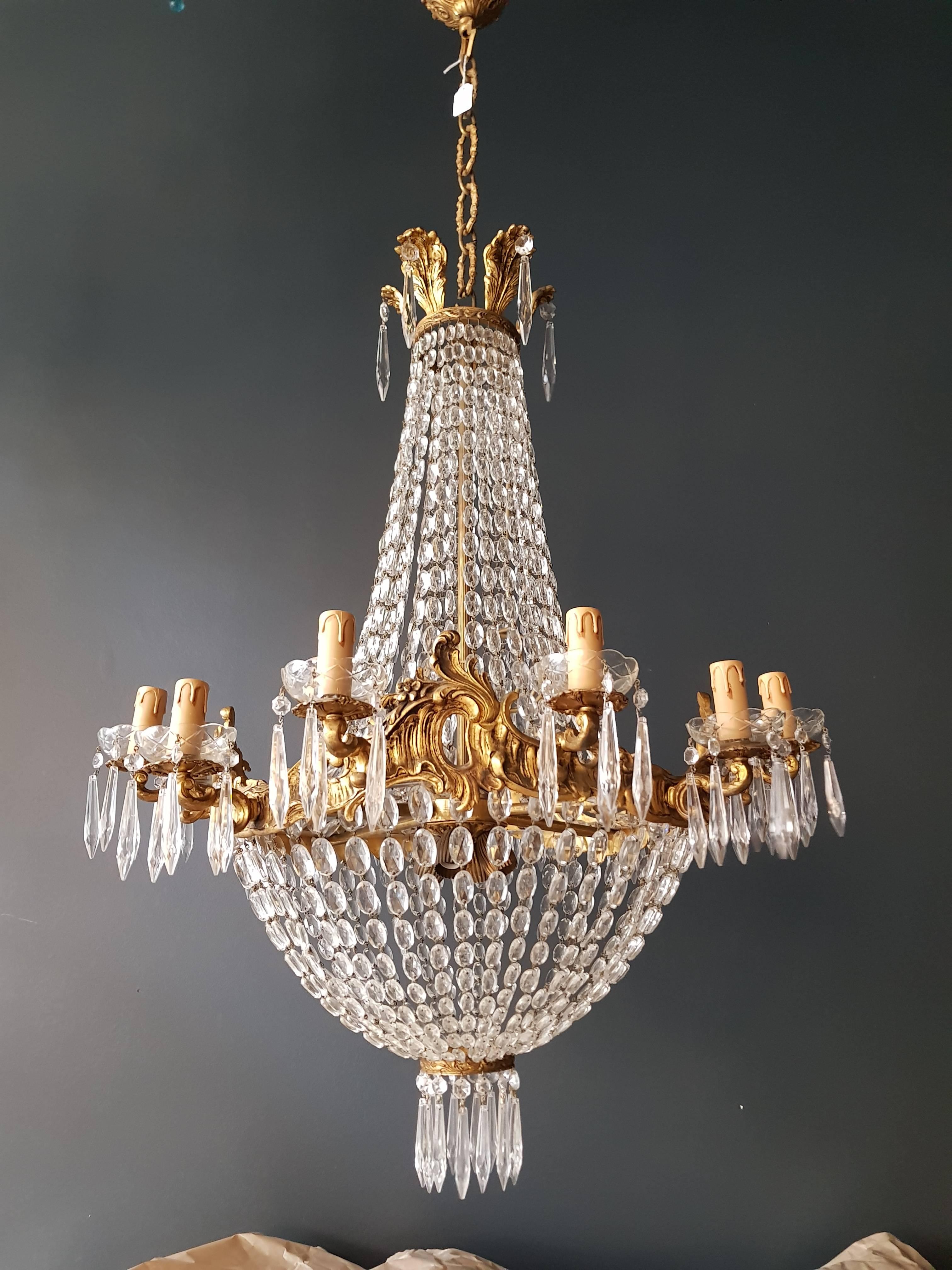Montgolfière Empire Chandelier Crystal Sac a Pearl Lamp Lustre Basket

Old chandelier with love and professionally restored in Berlin. electrical wiring works in the US.
Re-wired and ready to hang
Cabling and sockets completely renewed. Glass hand