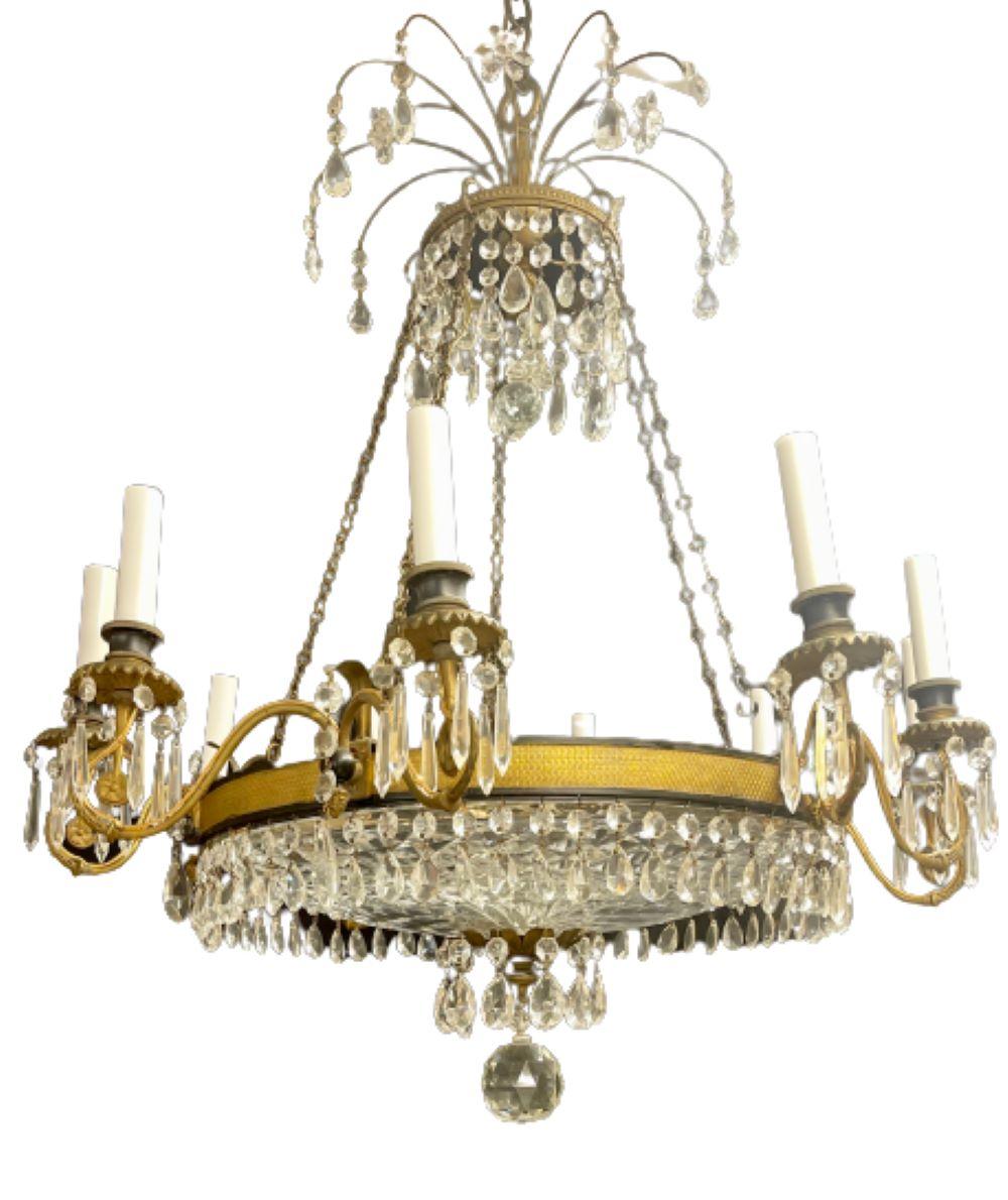 19th century Empire bronze and crystal chandelier having 10 lighted arms.