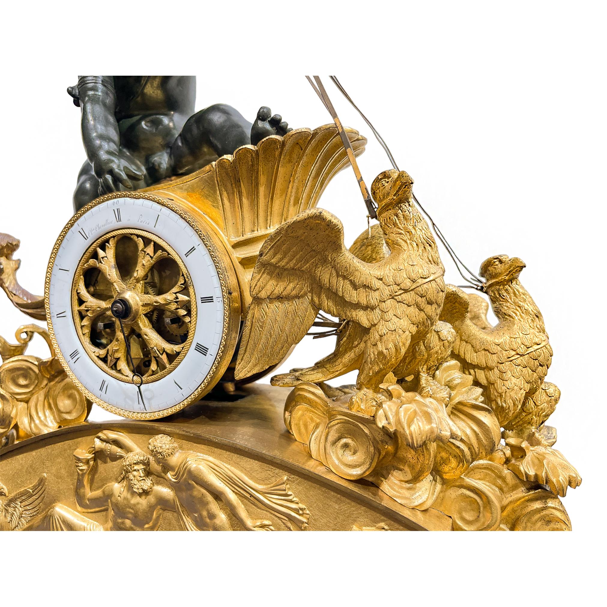 Gilt Empire Chariot Clock with Bronzed Putti, Eagles, and Neoclassical Bas Relief 