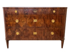 Empire Chest of Drawers in Figurative Yew Wood with Ormolu Escutcheons