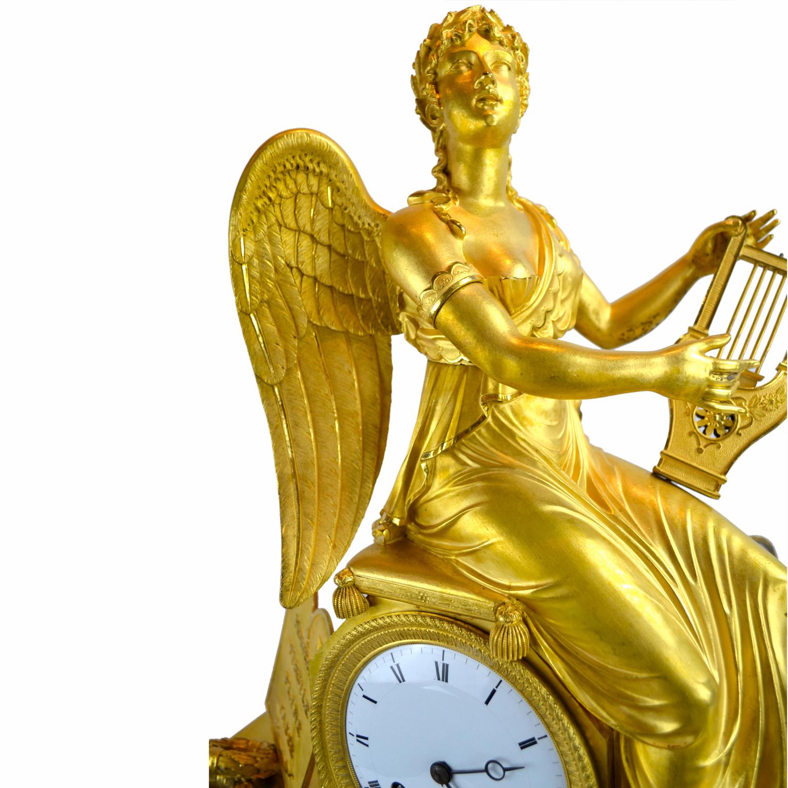 Gilt Bronze French Empire clock depicting an Allegory to Clio, the muse of history and music. In Greek mythology, Clio was the muse of history and of lyre playing. Like all the other nine muses, she is a daughter of Zeus and she counts Urania and