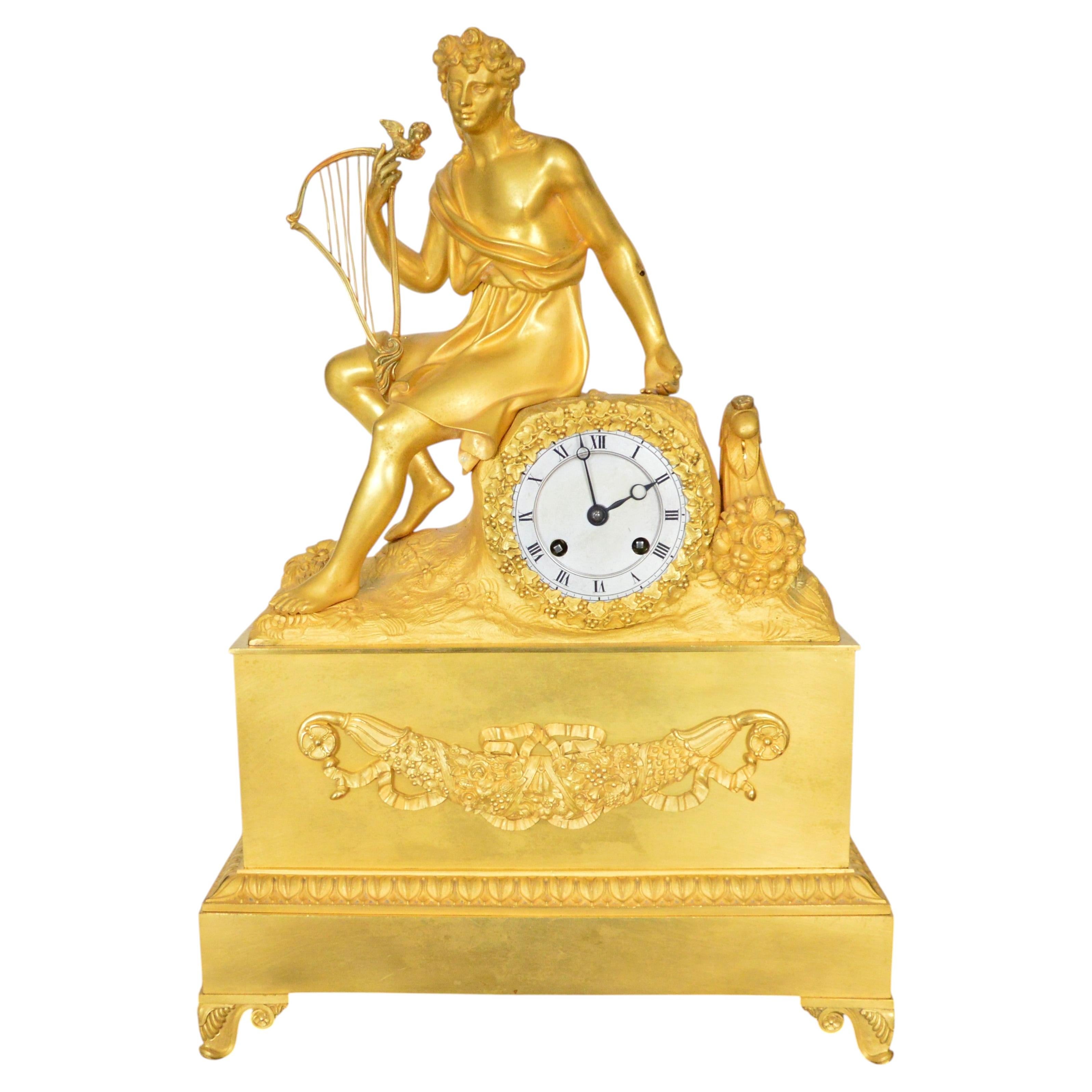 Empire clock, table clock, mantel clock, pendulum clock, bronze, fire-gilt