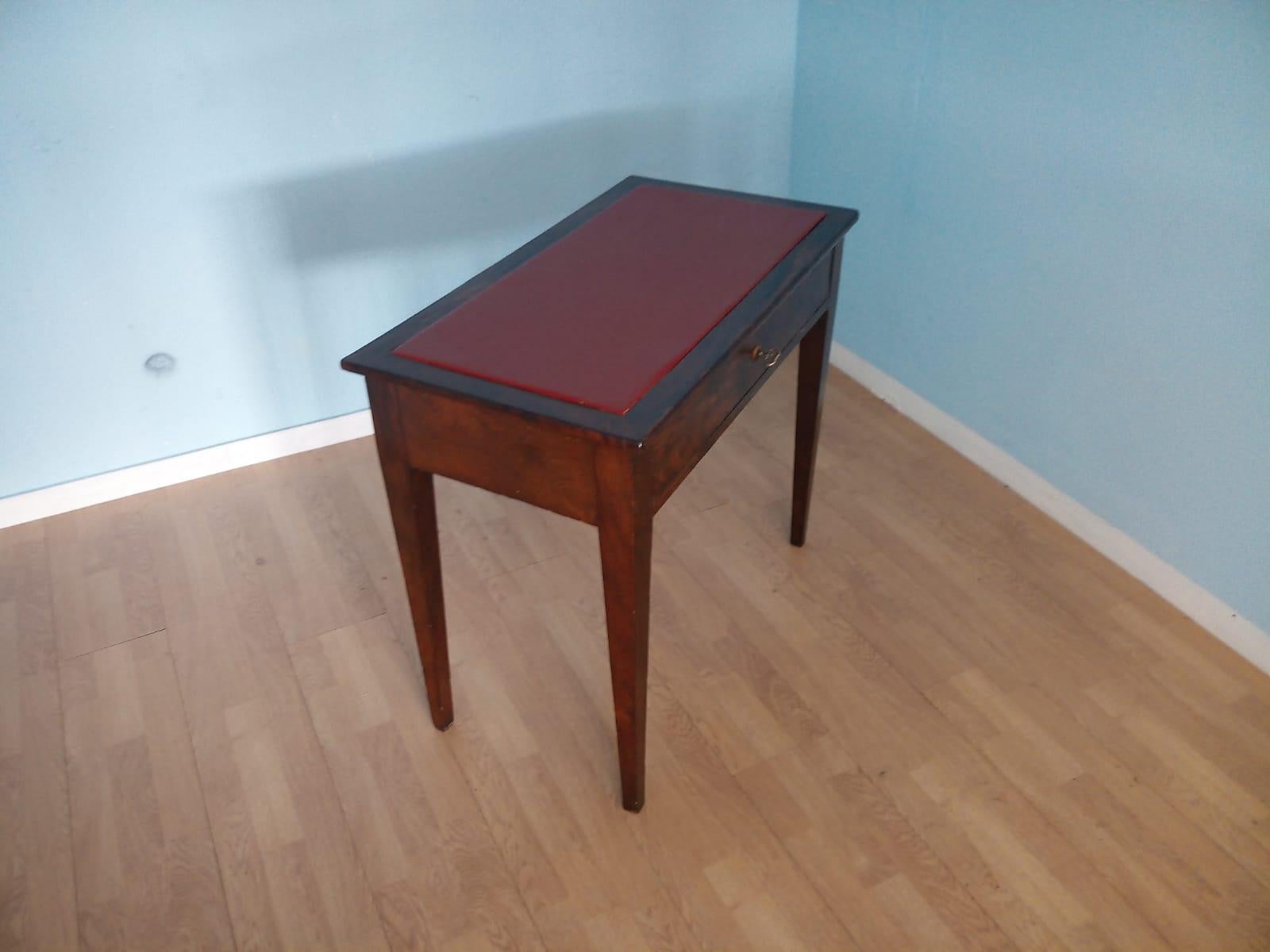 Desk small table

Made in the second half of the nineteenth century, this coffee table with very simple and composed lines adapts to any environment.

New burgundy leather top. the table has been completely restored.

Desk small table

Made