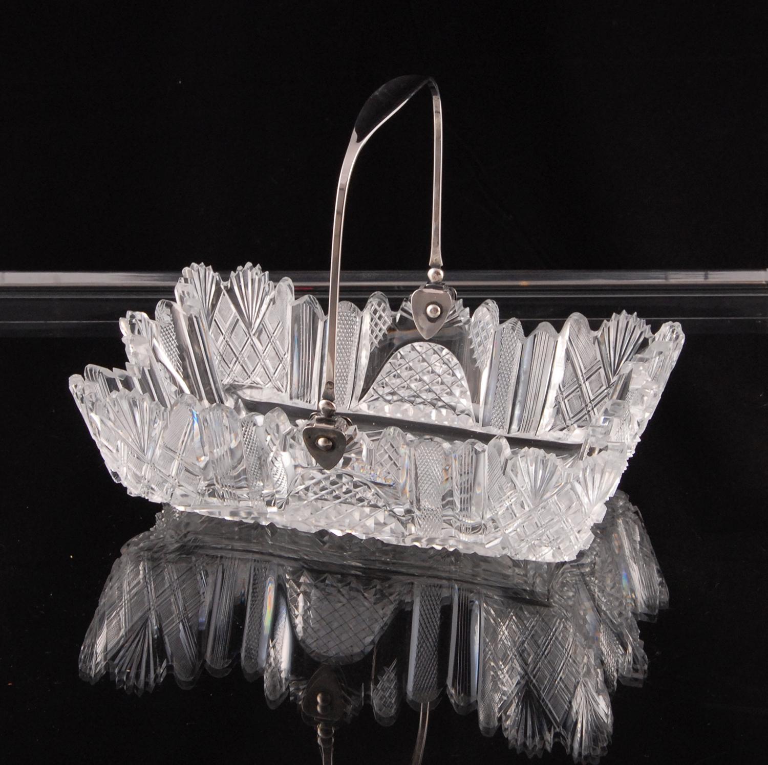 ntique large crystal bread basket with silver handle

Made of Regency cut crystal
The handle is made & marked jean Francois Warnots
Origin Flanders 1832 - 1838
Condition good

Width 10in. - 25.5cm
Height 7.5in. - 19cm
Depth 6.7in -