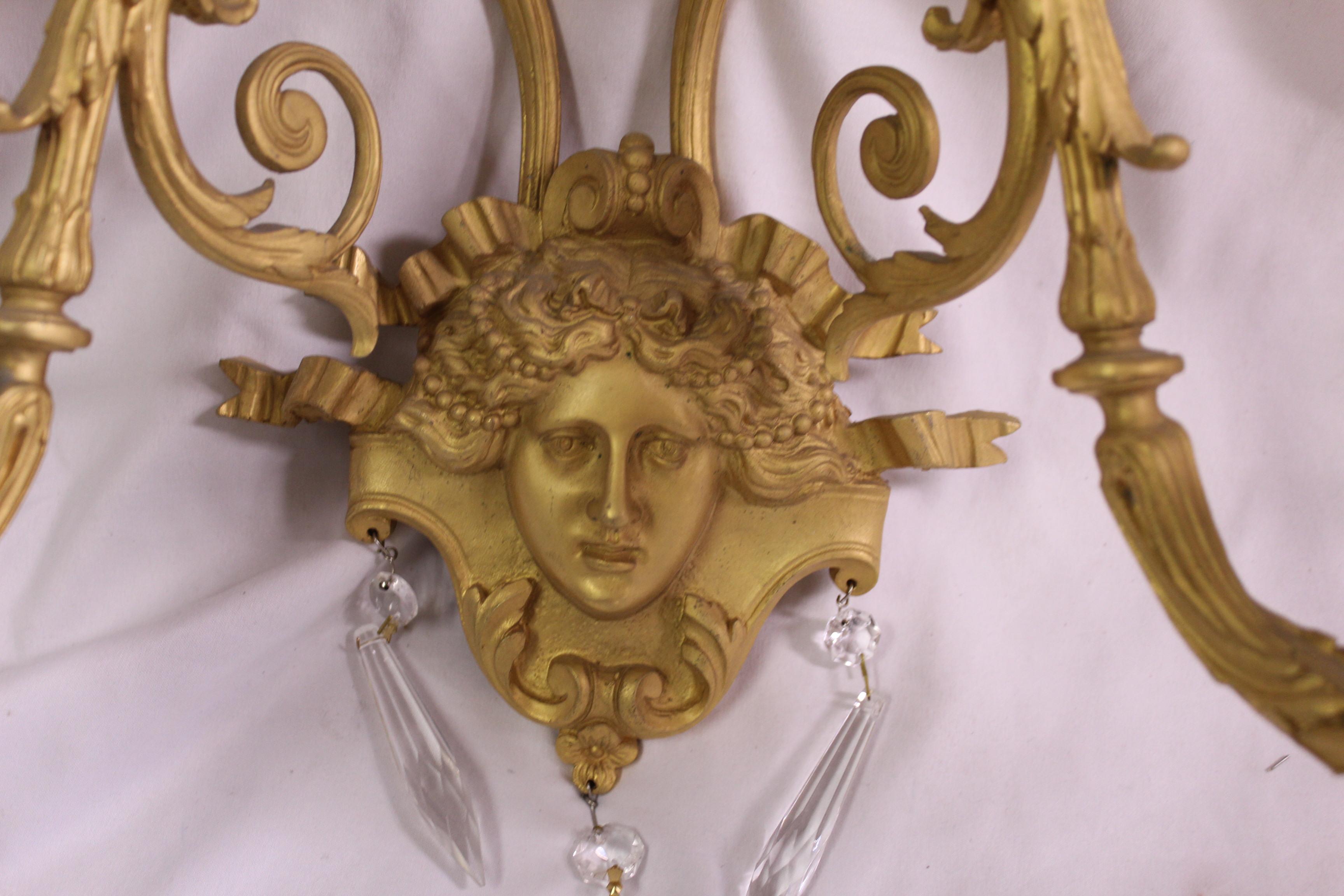 North American Empire Design of Lady Face Sconces Gold Dore' Finish For Sale