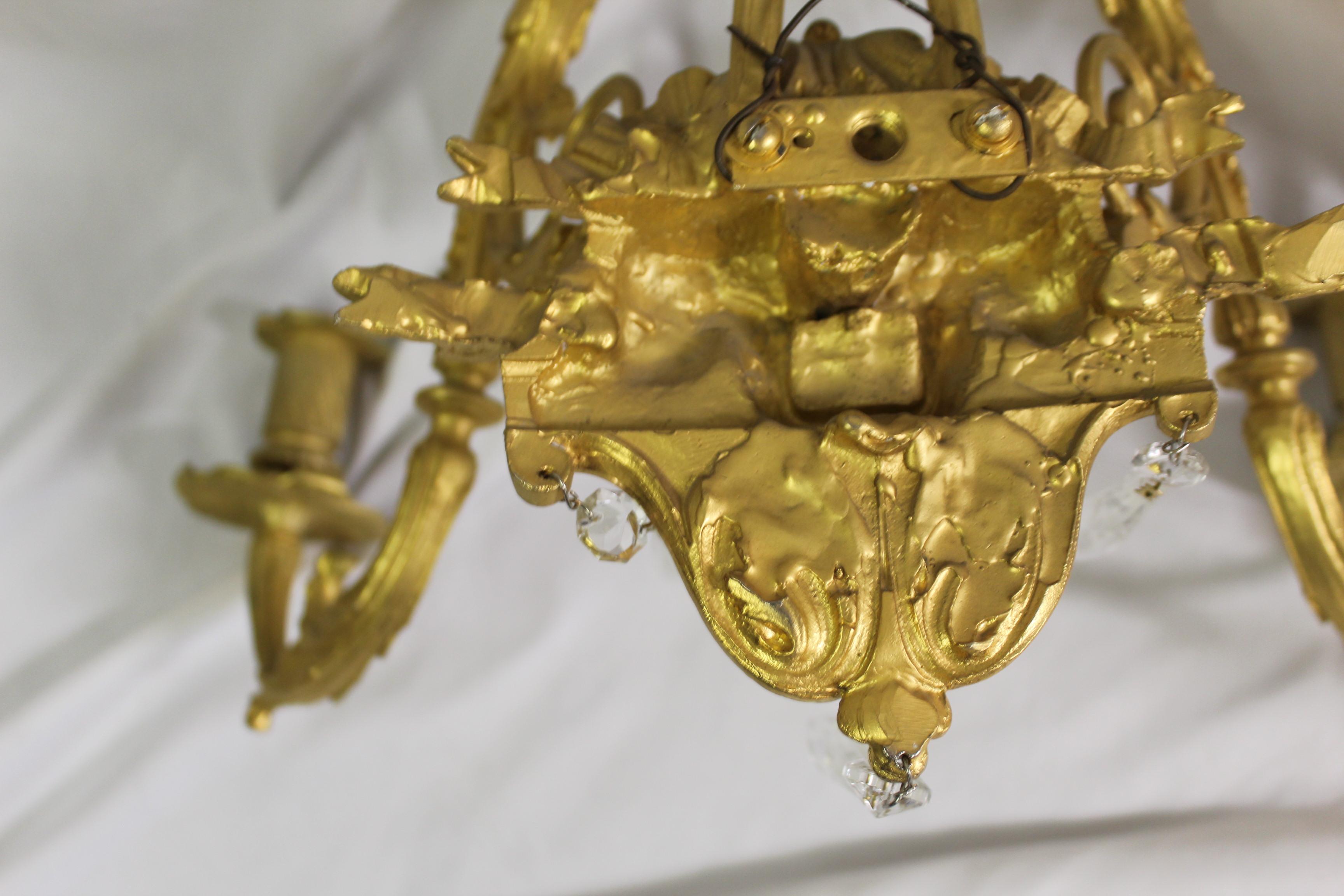 Cast Empire Design of Lady Face Sconces Gold Dore' Finish For Sale