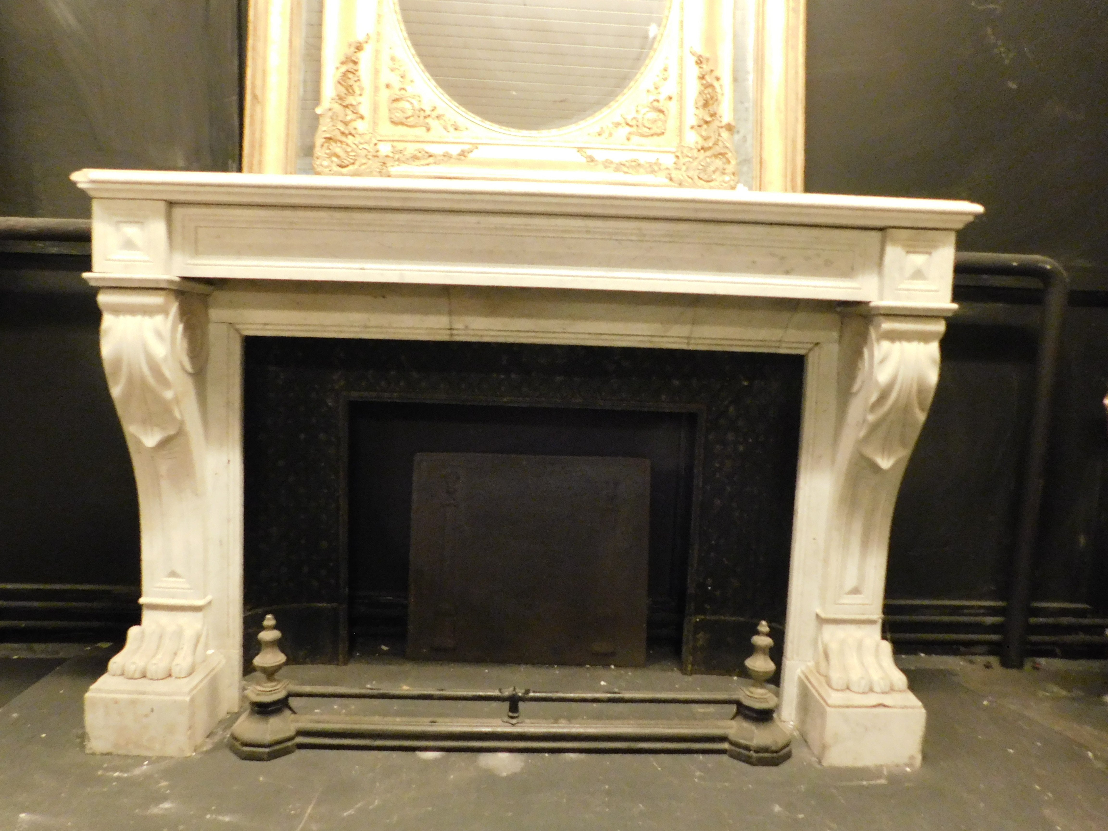 Empire fireplace mantle, carved in white Carrara marble lion's paw