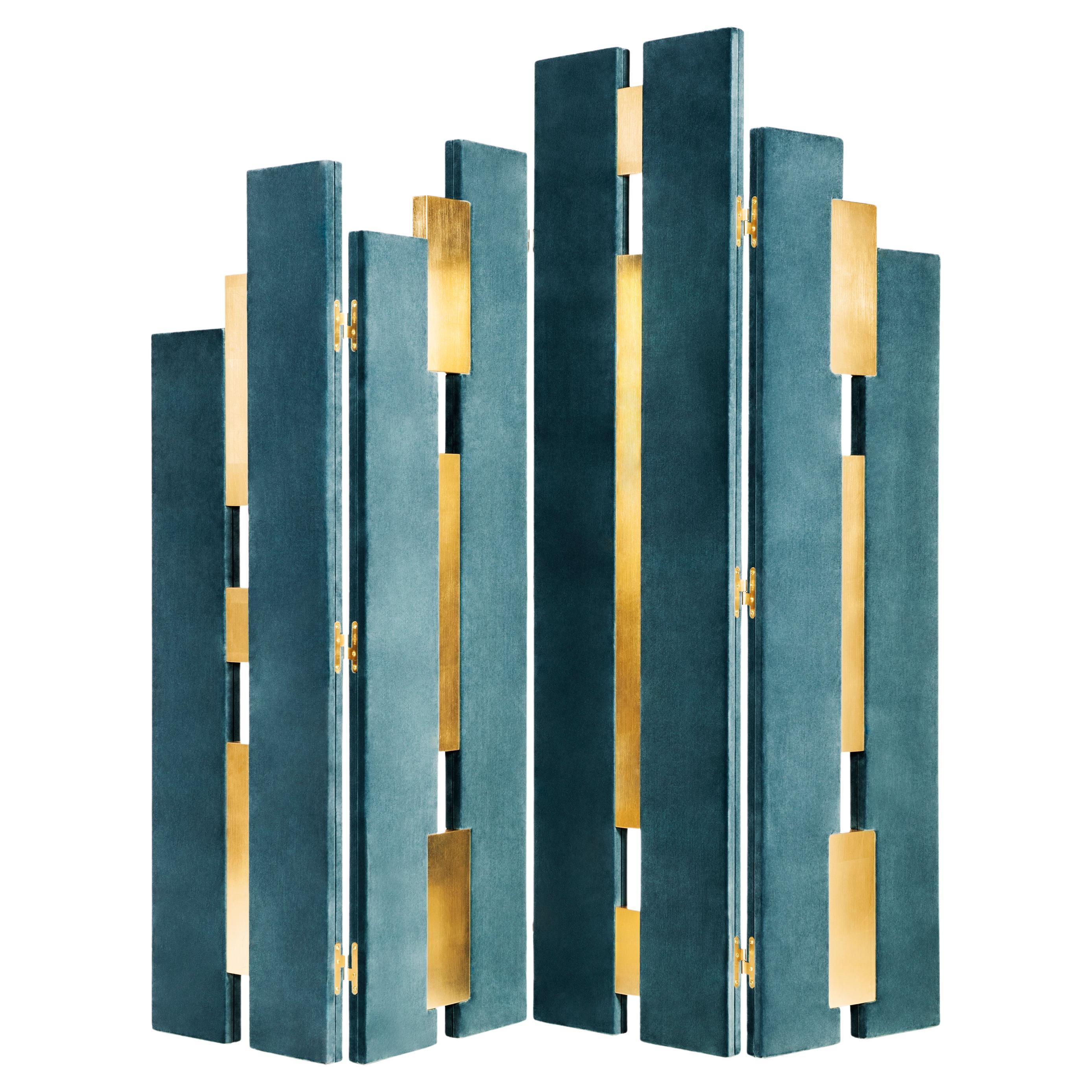 Empire Folding Screen by Munna
Dimensions: D 5 x W 212 x H 201 cm. 
Materials: Wood, upholstery, gold leaf, and brass.
Finish: Upholstery: Cotton Velvet. Wood panels: Gold Leaf with a gloss finish. Metal details: Polished brass.

Available in all