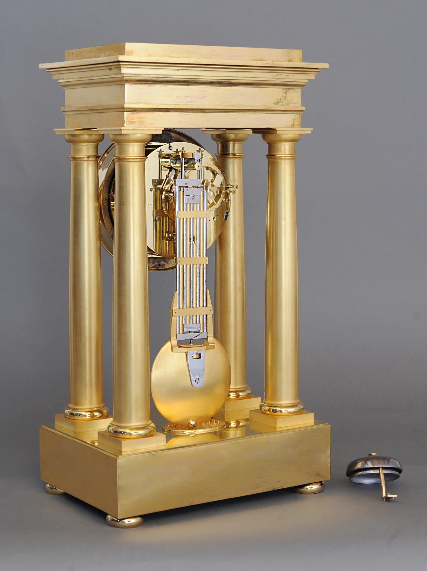 French Empire four pillar mantel clock by Dieudonné Kinable  For Sale