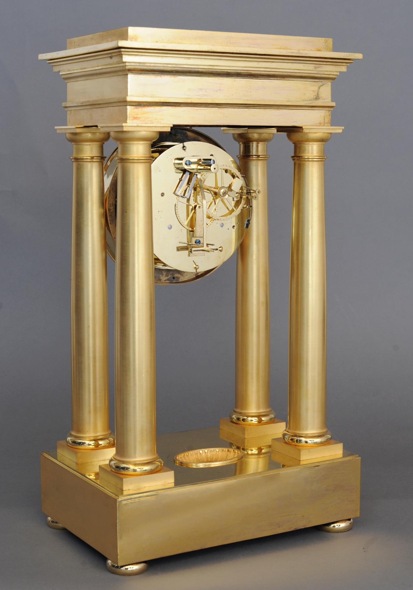 Empire four pillar mantel clock by Dieudonné Kinable  In Good Condition For Sale In HAARLEM, NL