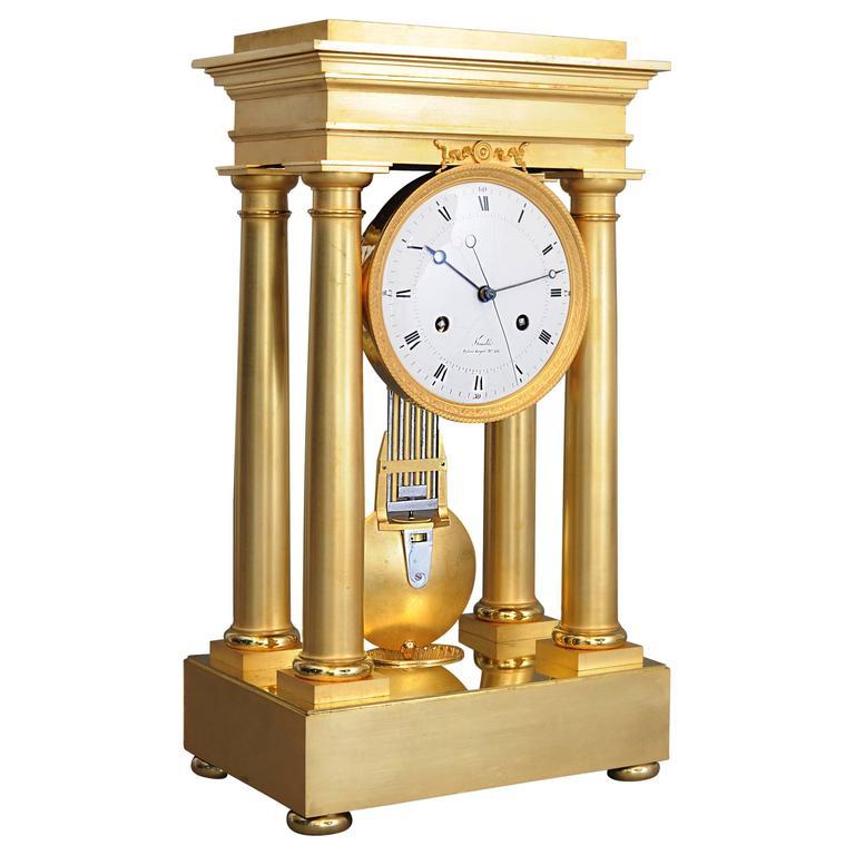 Empire four pillar mantel clock by Dieudonné Kinable  For Sale