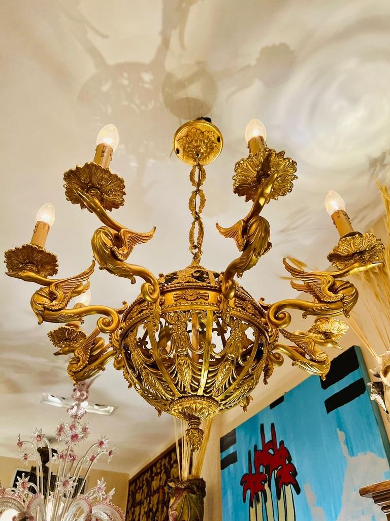 French Empire french bronze chandelier in gold-plated with 'Quimeras