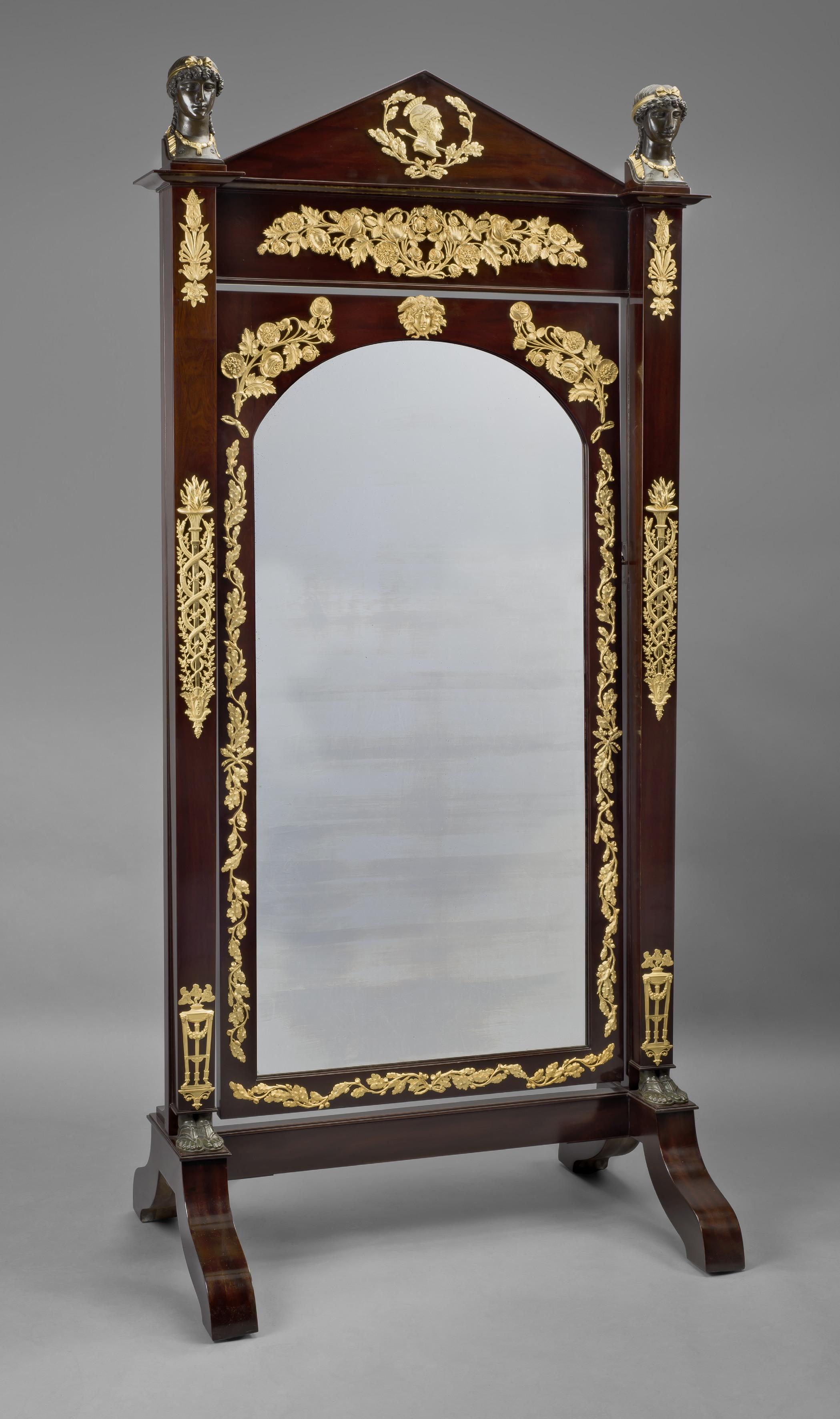 A very fine Empire gilt and patinated bronze mounted mahogany cheval mirror or 'Psyché'. 

French, circa 1820. 

This fine Empire style mahogany cheval mirror or 'Psyché' is of exceptional quality, with finely cast gilt-bronze mounts and