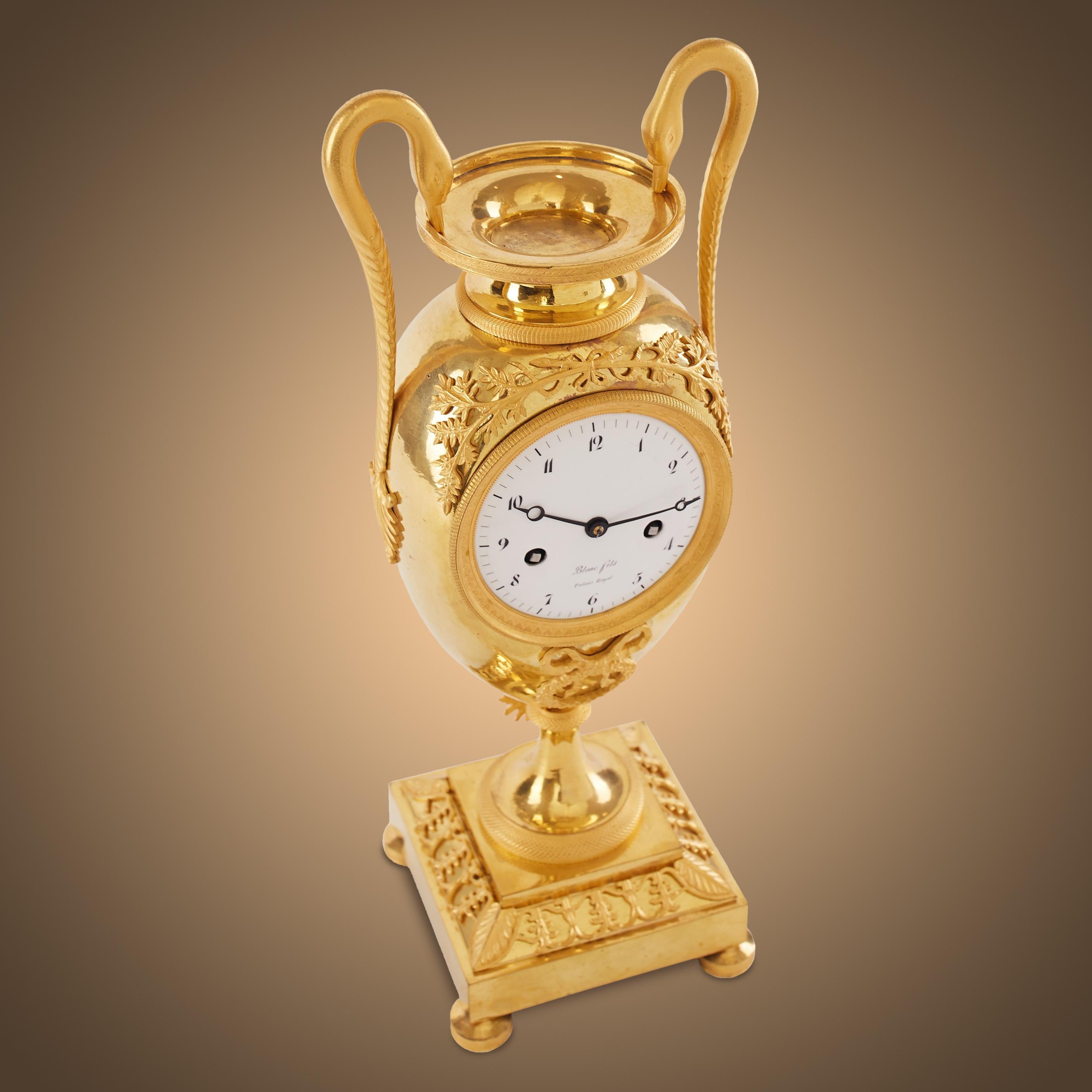 French Empire Gilt Bronze Vase Clock Circa 1810 Attributed to Claude Galle For Sale