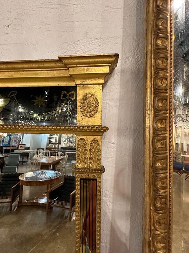 Miroir Empire en bois doré et églomisé Bon état - En vente à Dallas, TX