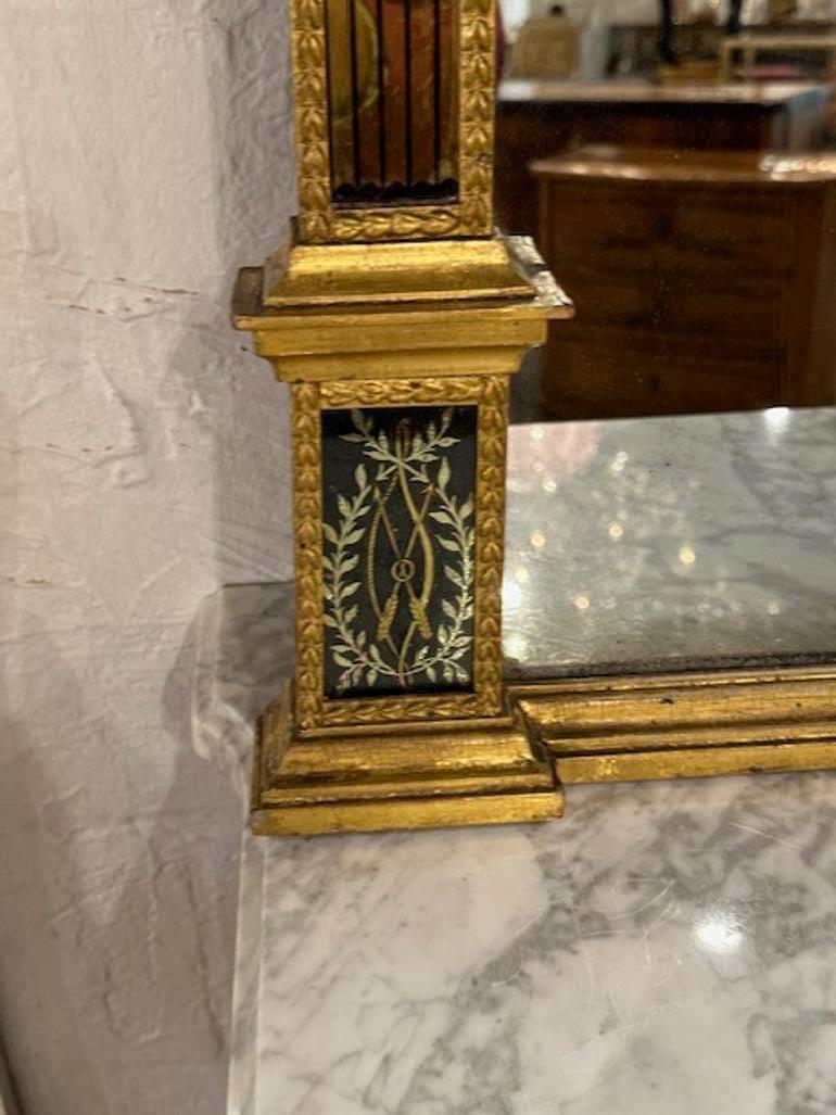 Miroir Empire en bois doré et églomisé en vente 1
