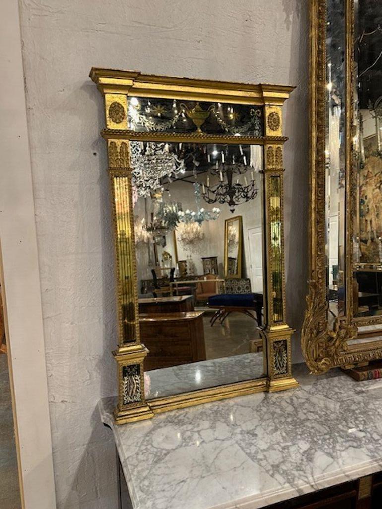 Miroir Empire en bois doré et églomisé en vente 2