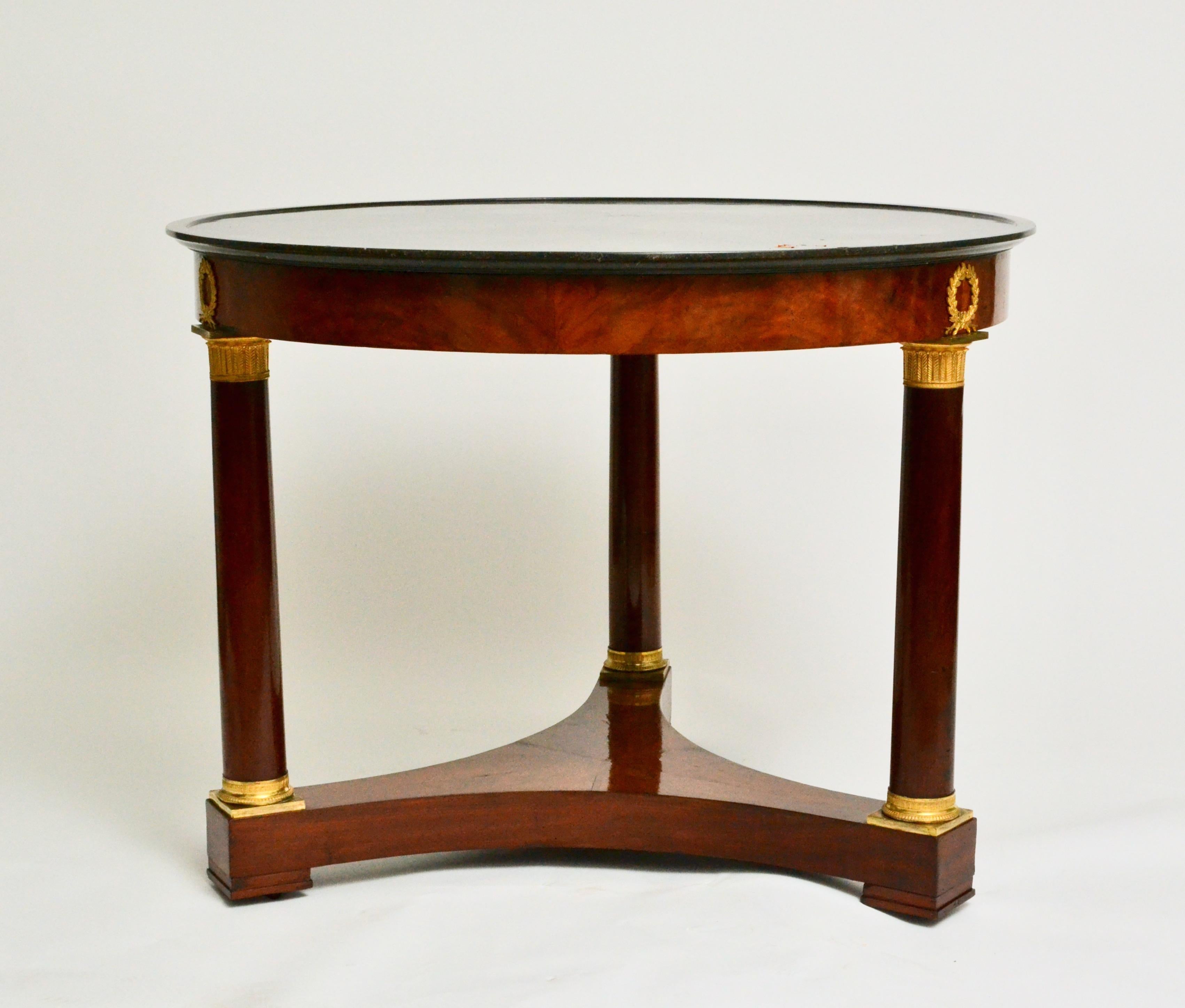 19th Century Empire Gueridon or Center Table With Black Marble Top With Gilt Bronze Mounts.
